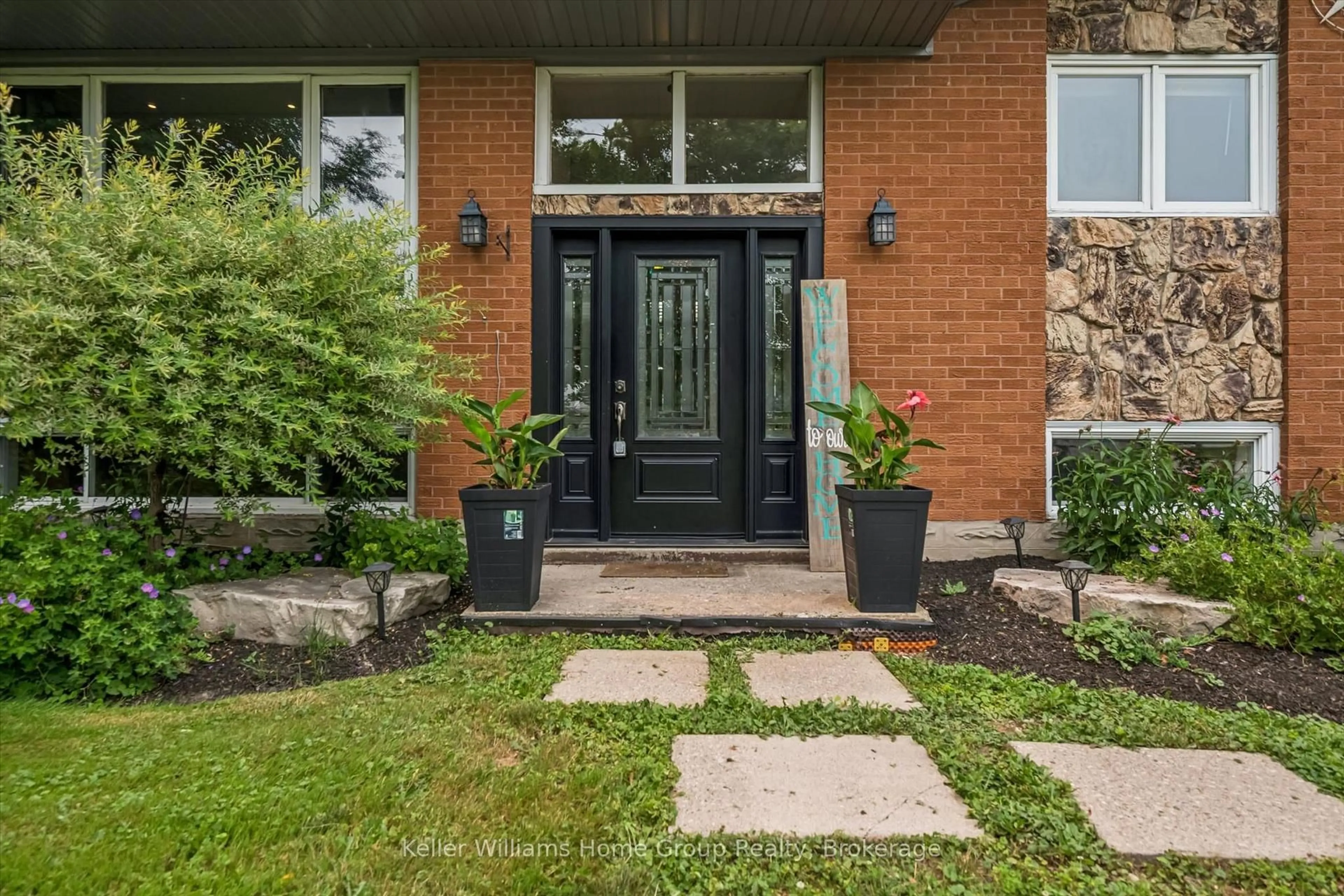 Home with brick exterior material, street for 7988 Wellington Road 12, Wellington North Ontario N0G 1A0
