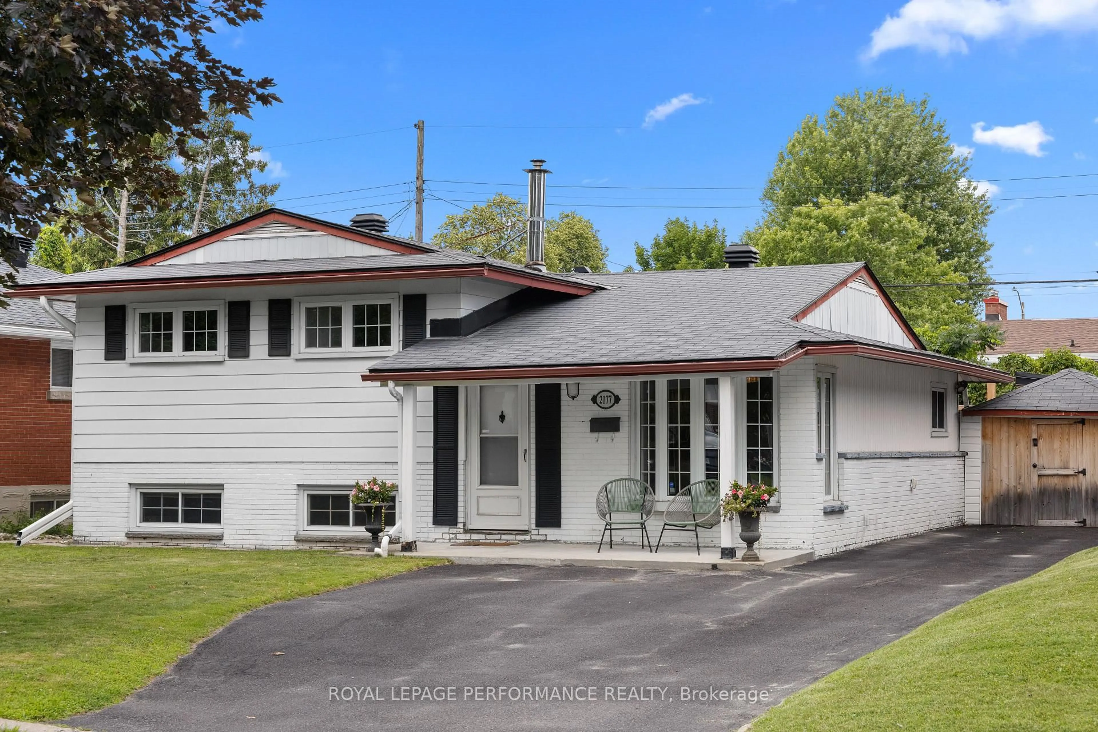 Home with vinyl exterior material, street for 2177 Bingham St, Ottawa Ontario K1G 2V6
