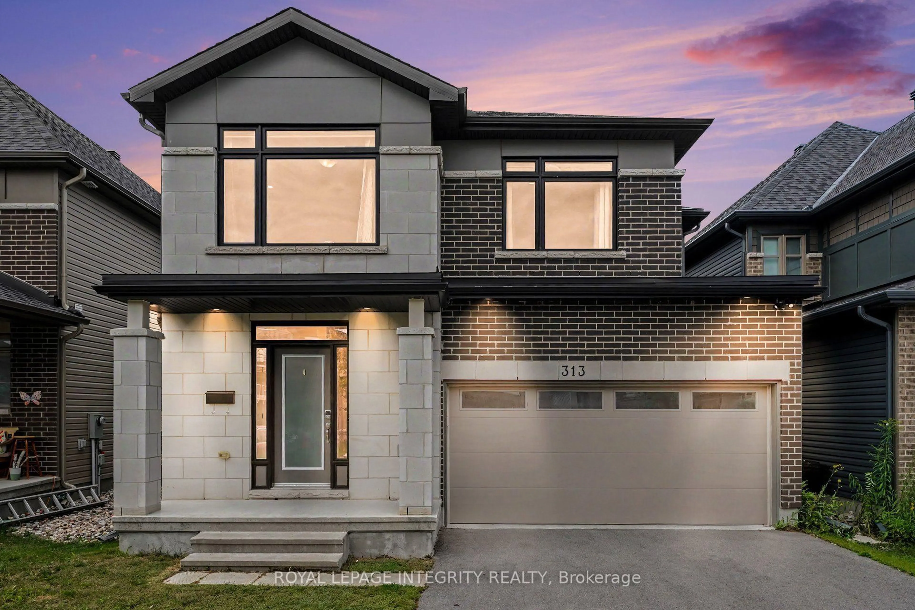 Home with brick exterior material, street for 313 Chamomile Way, Ottawa Ontario K1T 0X1