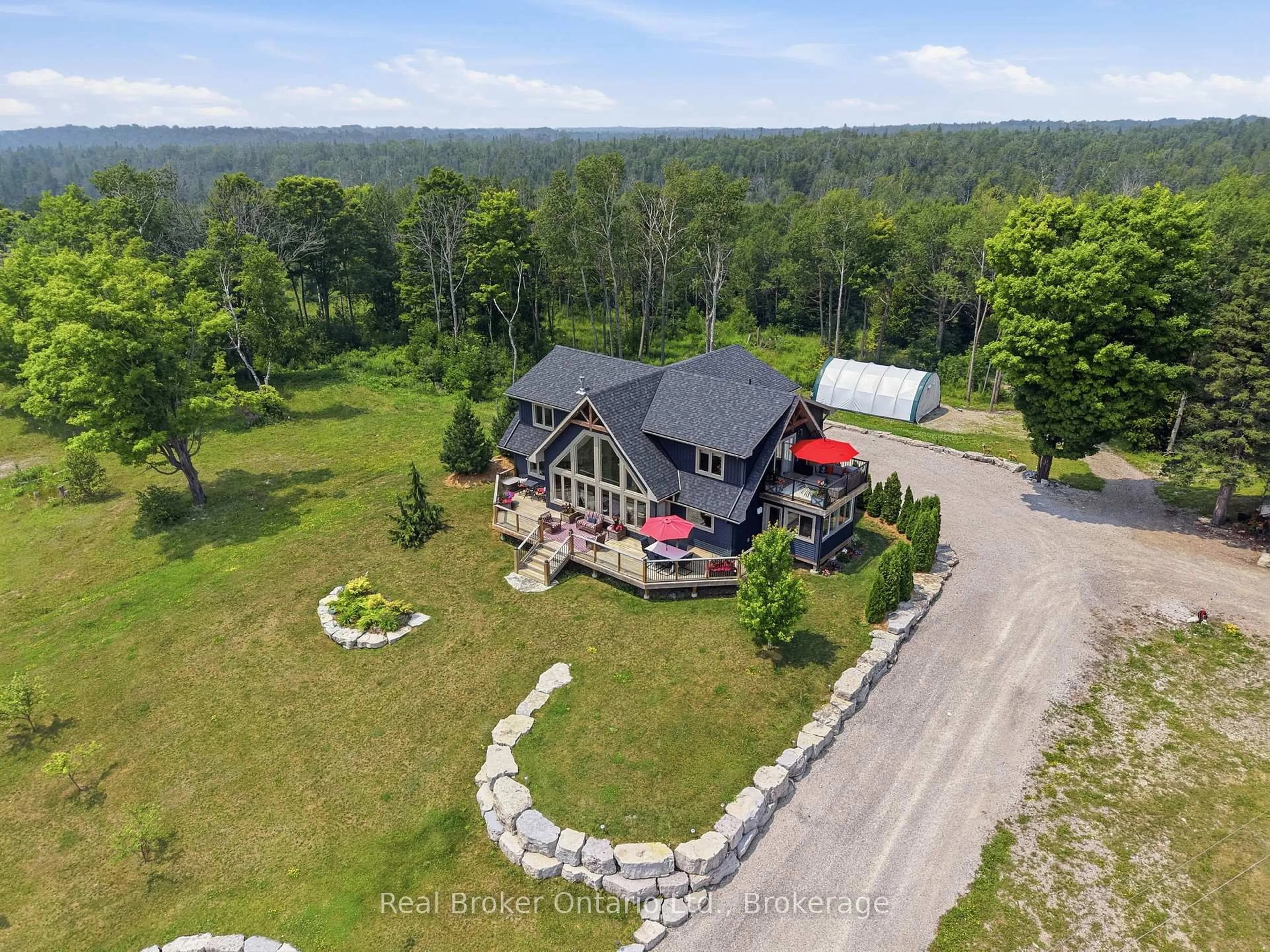 A pic from outside/outdoor area/front of a property/back of a property/a pic from drone, unknown for 112 TAMARAC Rd, Northern Bruce Peninsula Ontario N0H 1W0