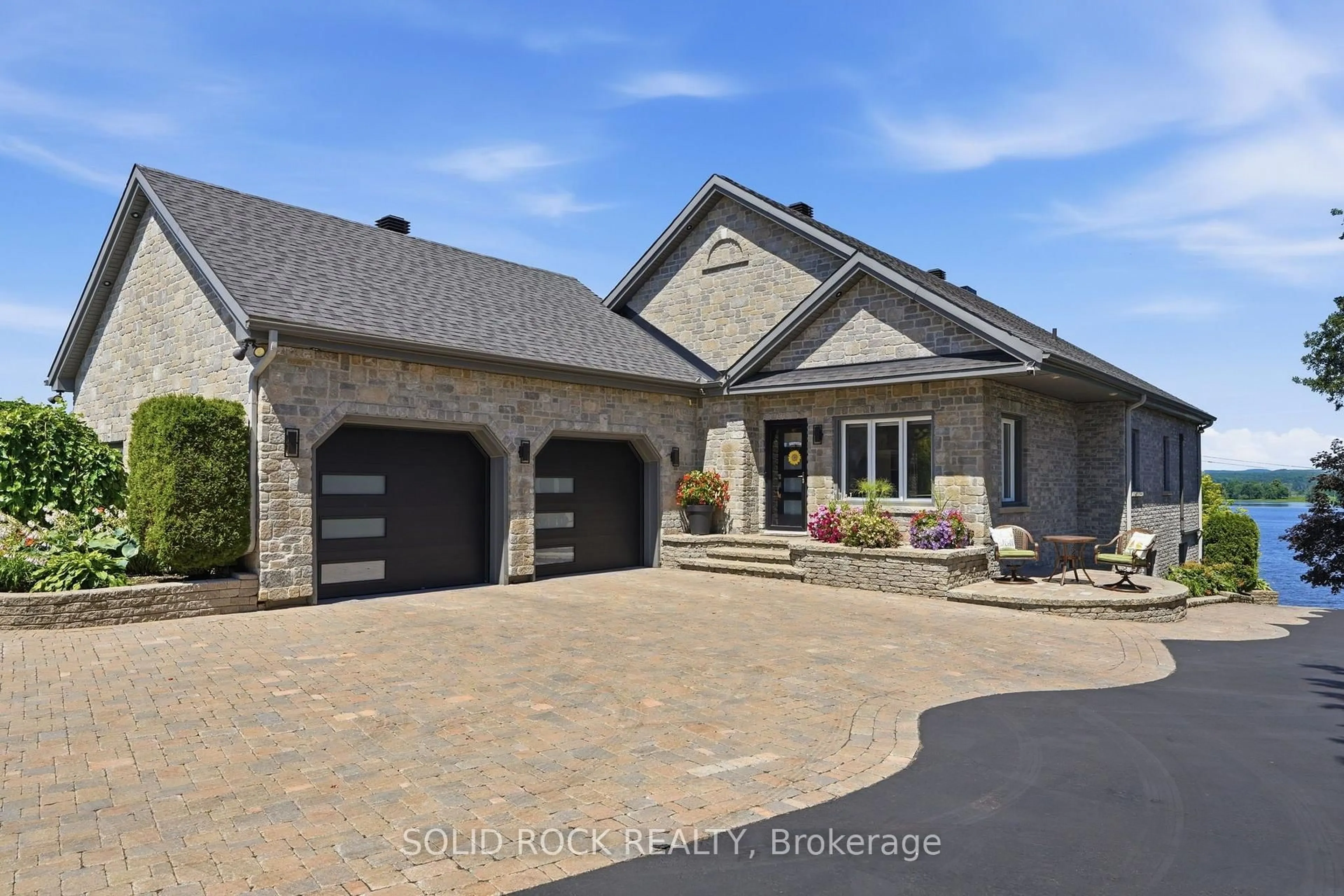 Home with brick exterior material, street for 3835 Old Highway 17 Rd, Clarence-Rockland Ontario K4K 1W2