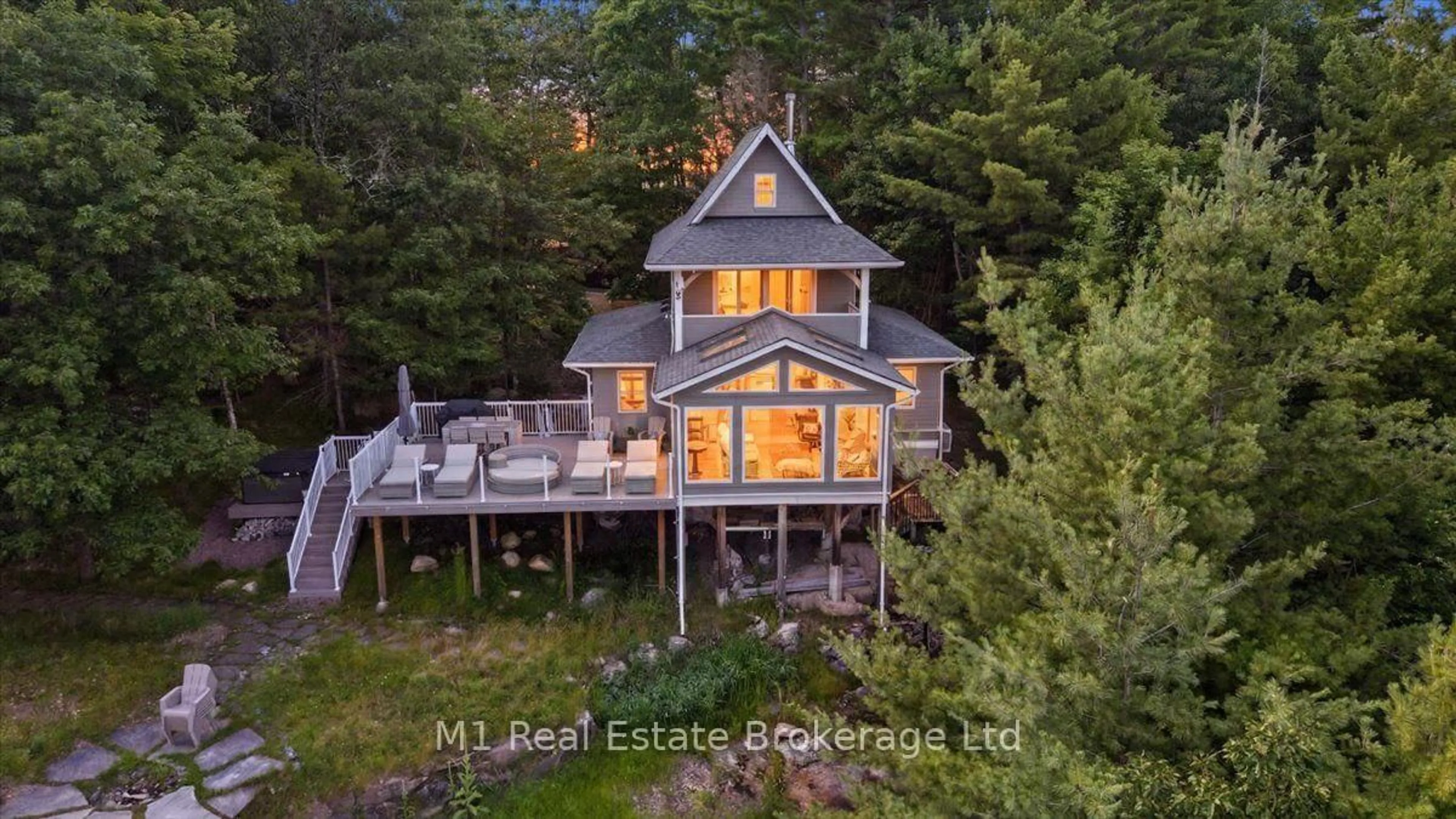 A pic from outside/outdoor area/front of a property/back of a property/a pic from drone, water/lake/river/ocean view for 1106 Stephen Rd, Muskoka Lakes Ontario P0B 1M0