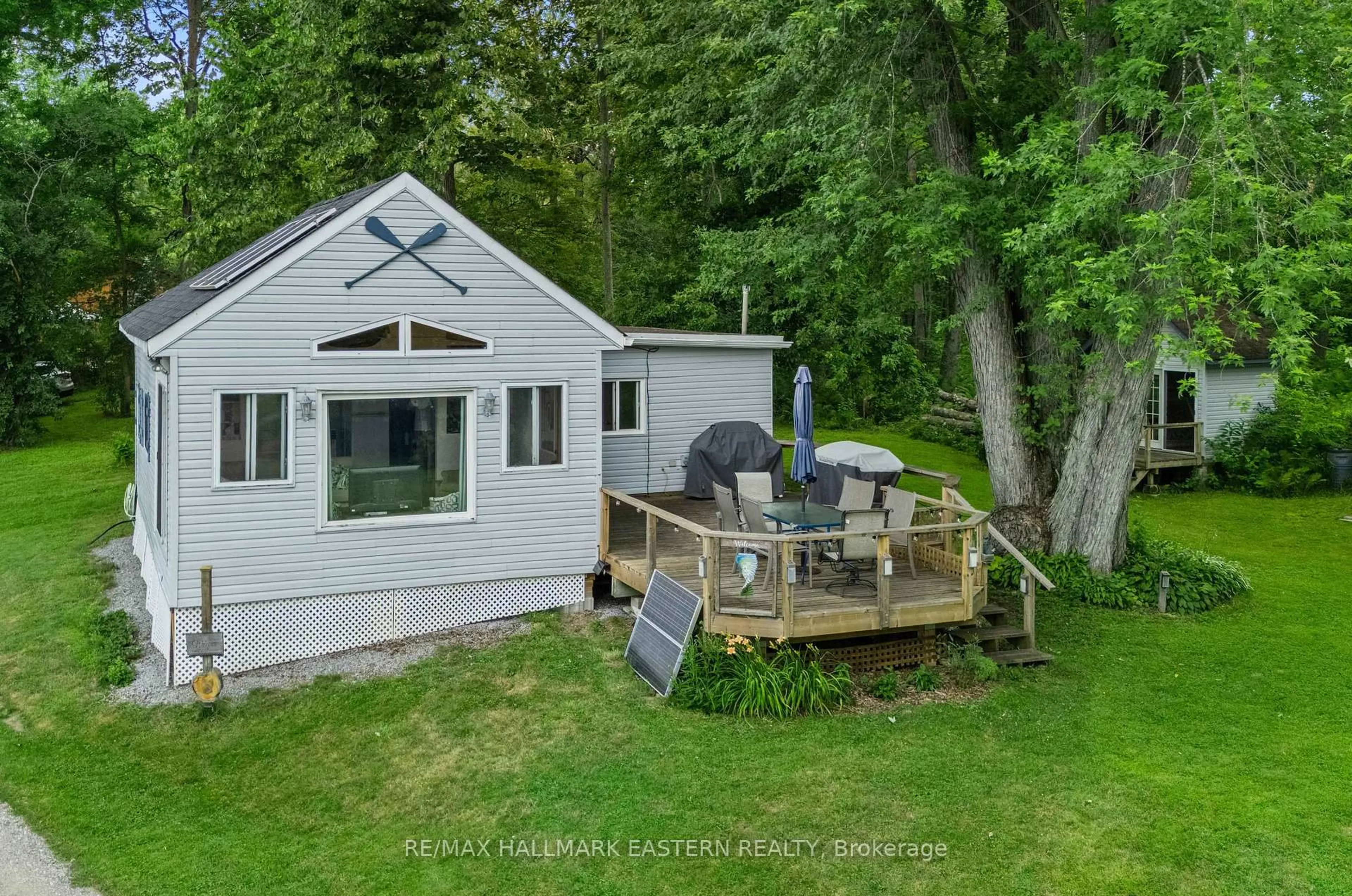 A pic from outside/outdoor area/front of a property/back of a property/a pic from drone, water/lake/river/ocean view for 730 Mervin Line, Cavan Monaghan Ontario K9J 6Z9