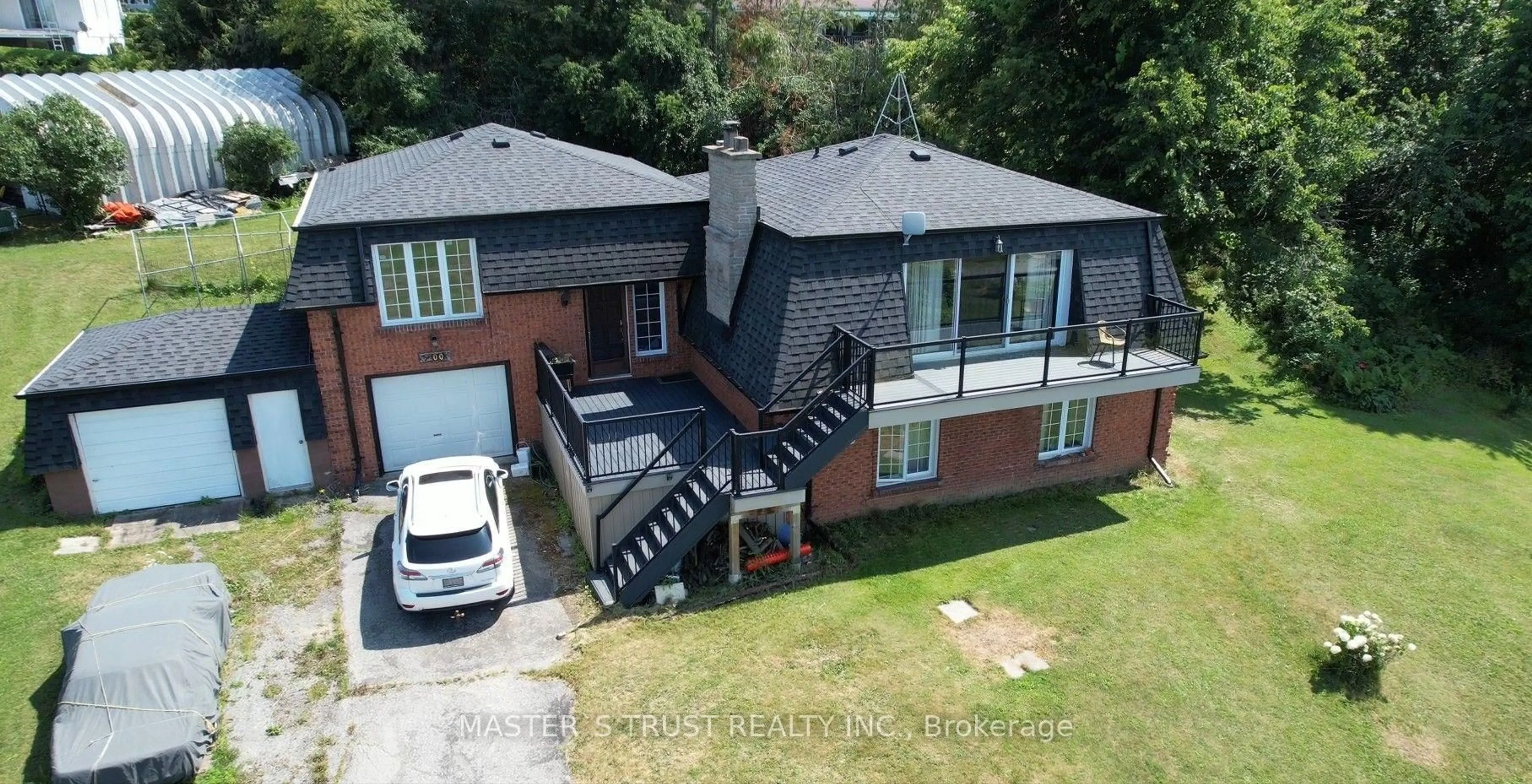A pic from outside/outdoor area/front of a property/back of a property/a pic from drone, building for 200 SUMMIT Dr, Selwyn Ontario K0L 1T0