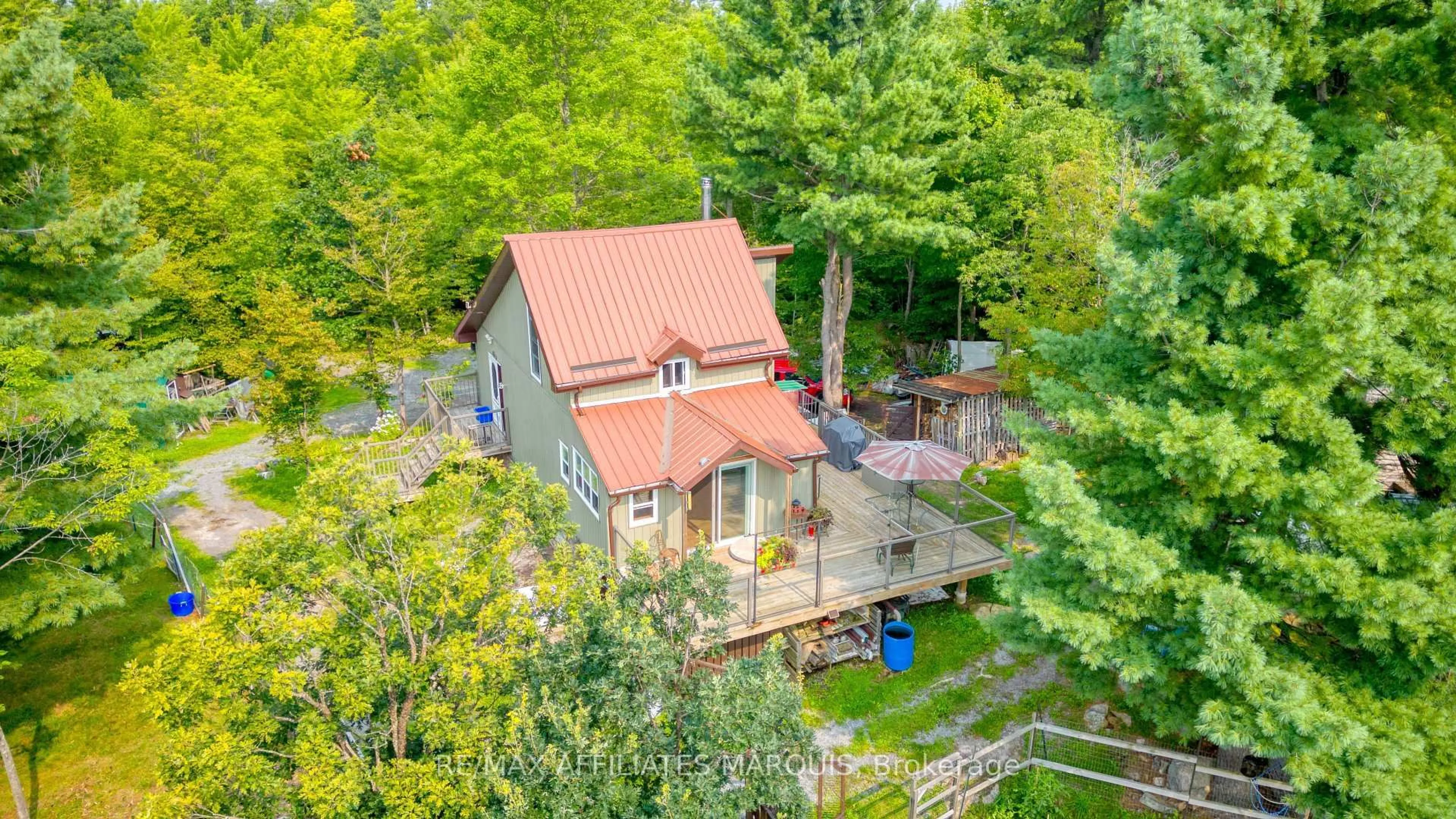 A pic from outside/outdoor area/front of a property/back of a property/a pic from drone, unknown for 19 West Devil Lk Lane, Inverary Ontario K0H 1X0
