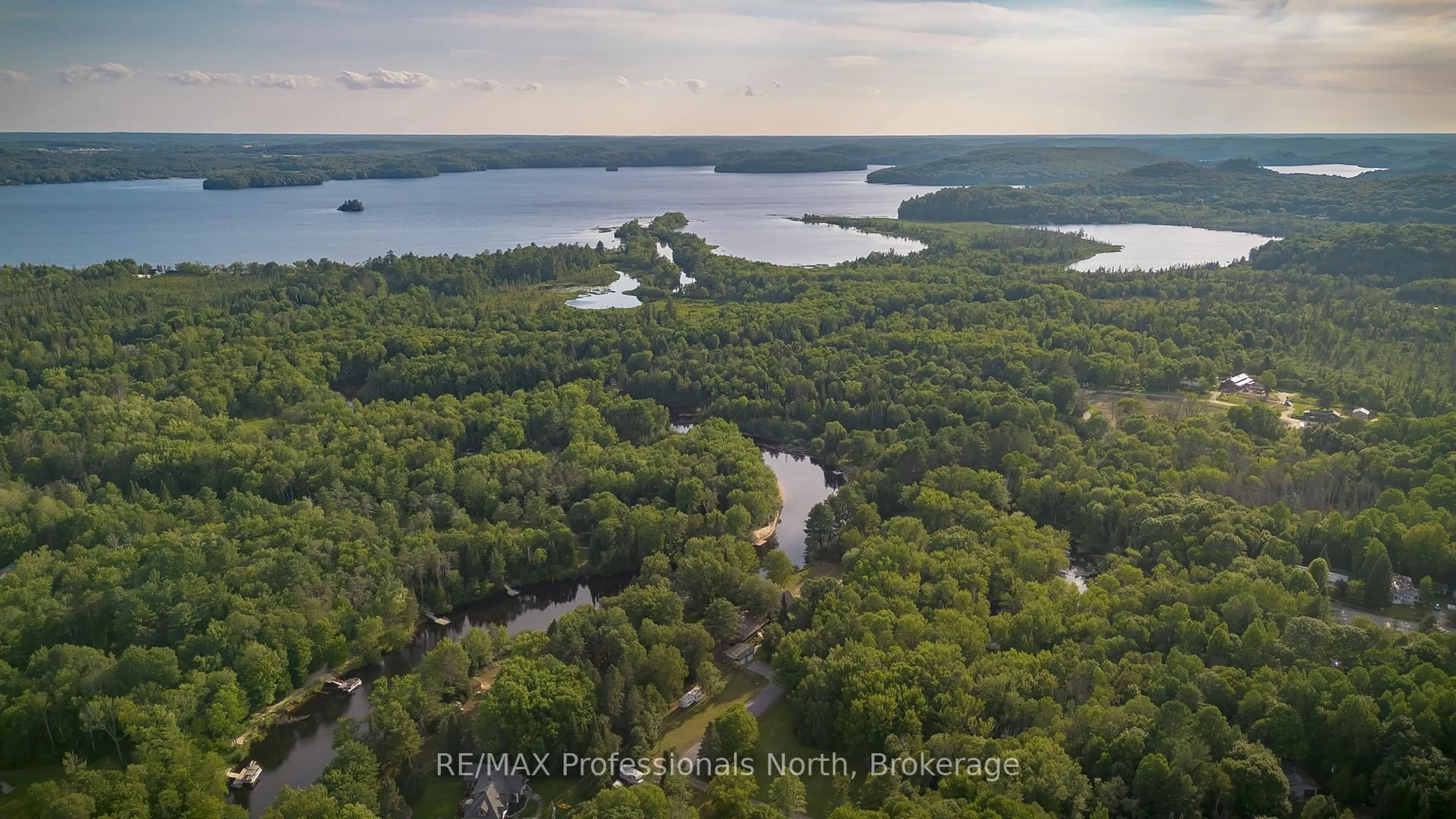 A pic from outside/outdoor area/front of a property/back of a property/a pic from drone, water/lake/river/ocean view for 55 GLEN ACRES Rd, Huntsville Ontario P1H 1N6
