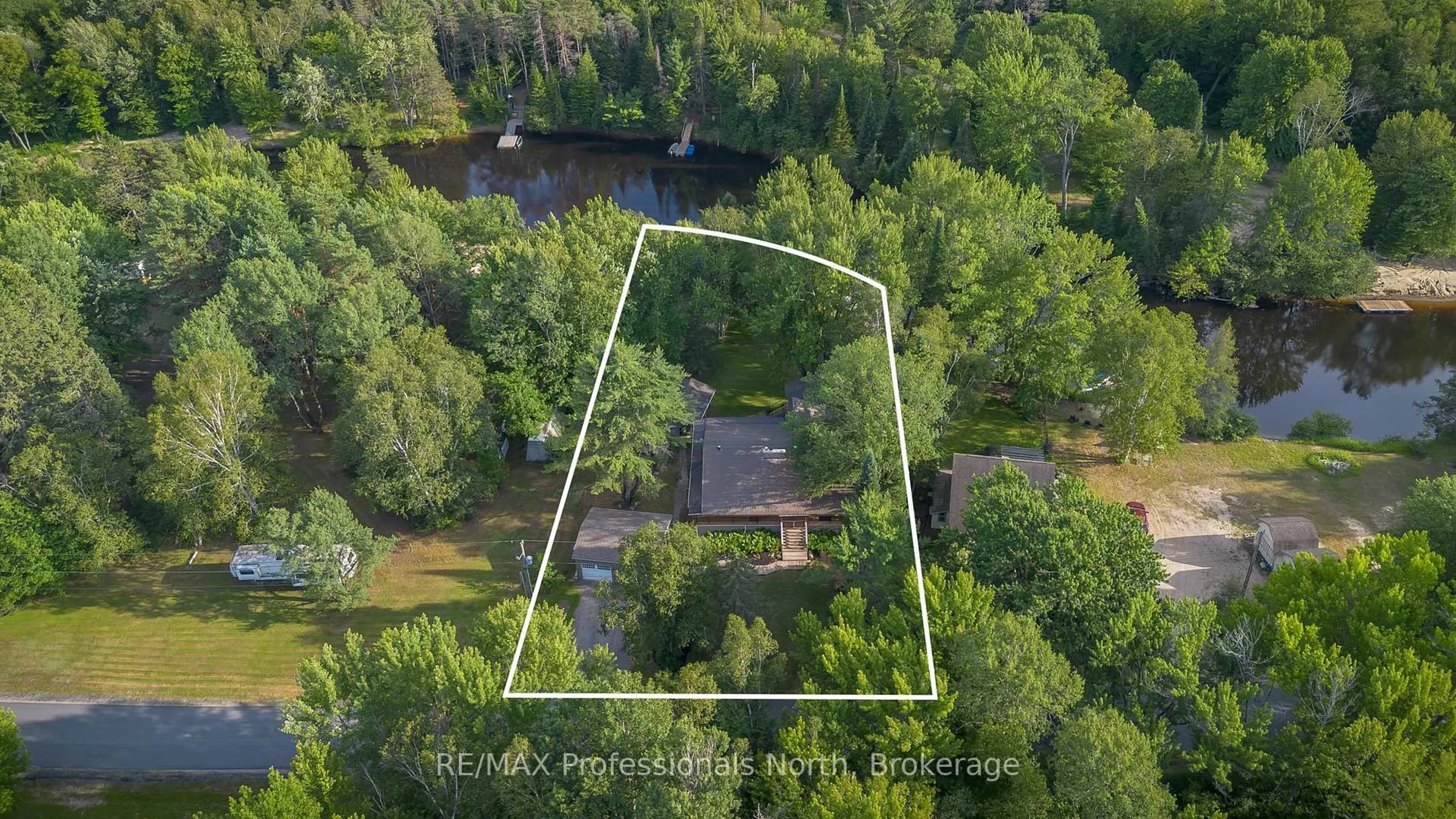 A pic from outside/outdoor area/front of a property/back of a property/a pic from drone, water/lake/river/ocean view for 55 GLEN ACRES Rd, Huntsville Ontario P1H 1N6