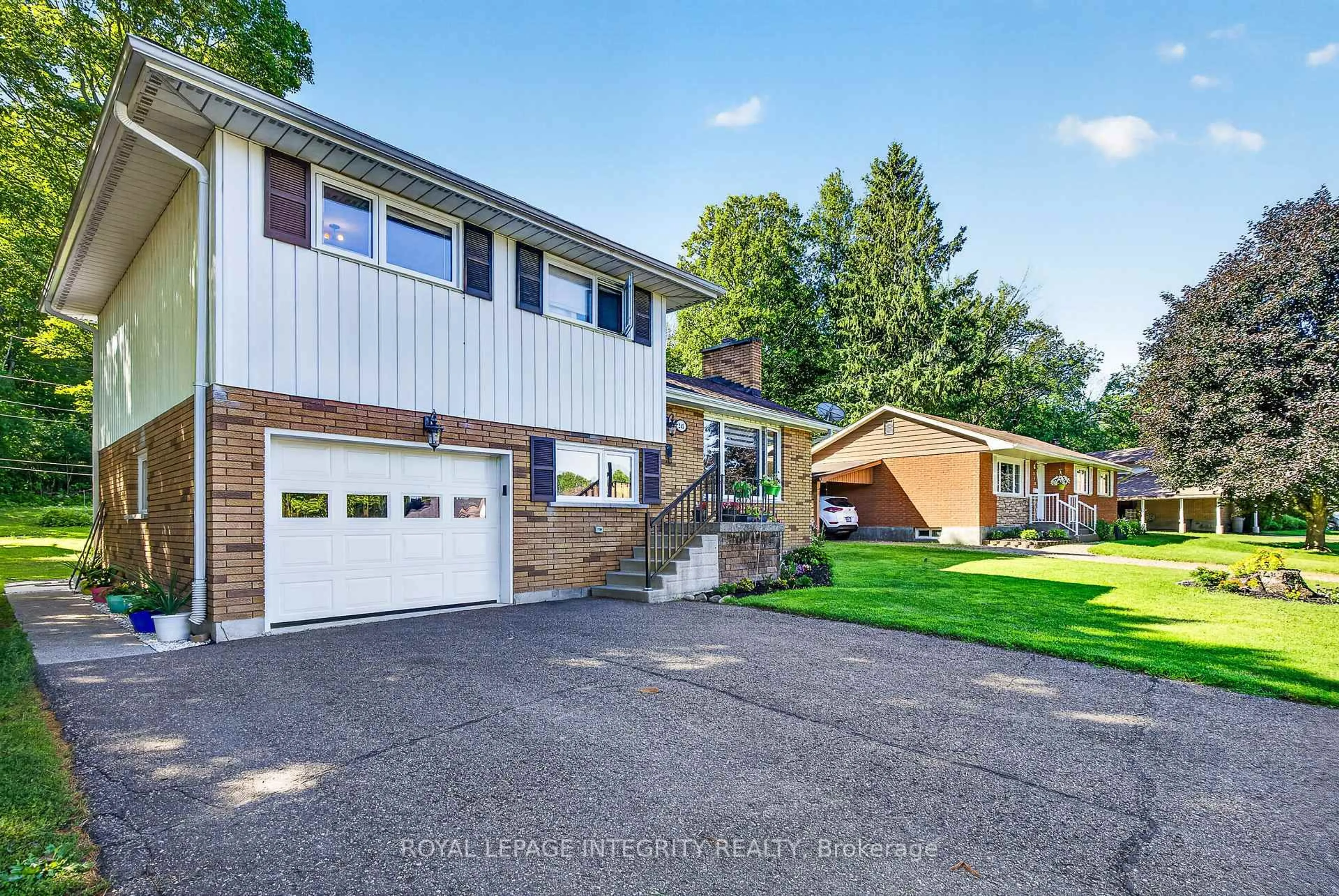 Home with vinyl exterior material, street for 241 Wade Ave, Renfrew Ontario K7V 2N5