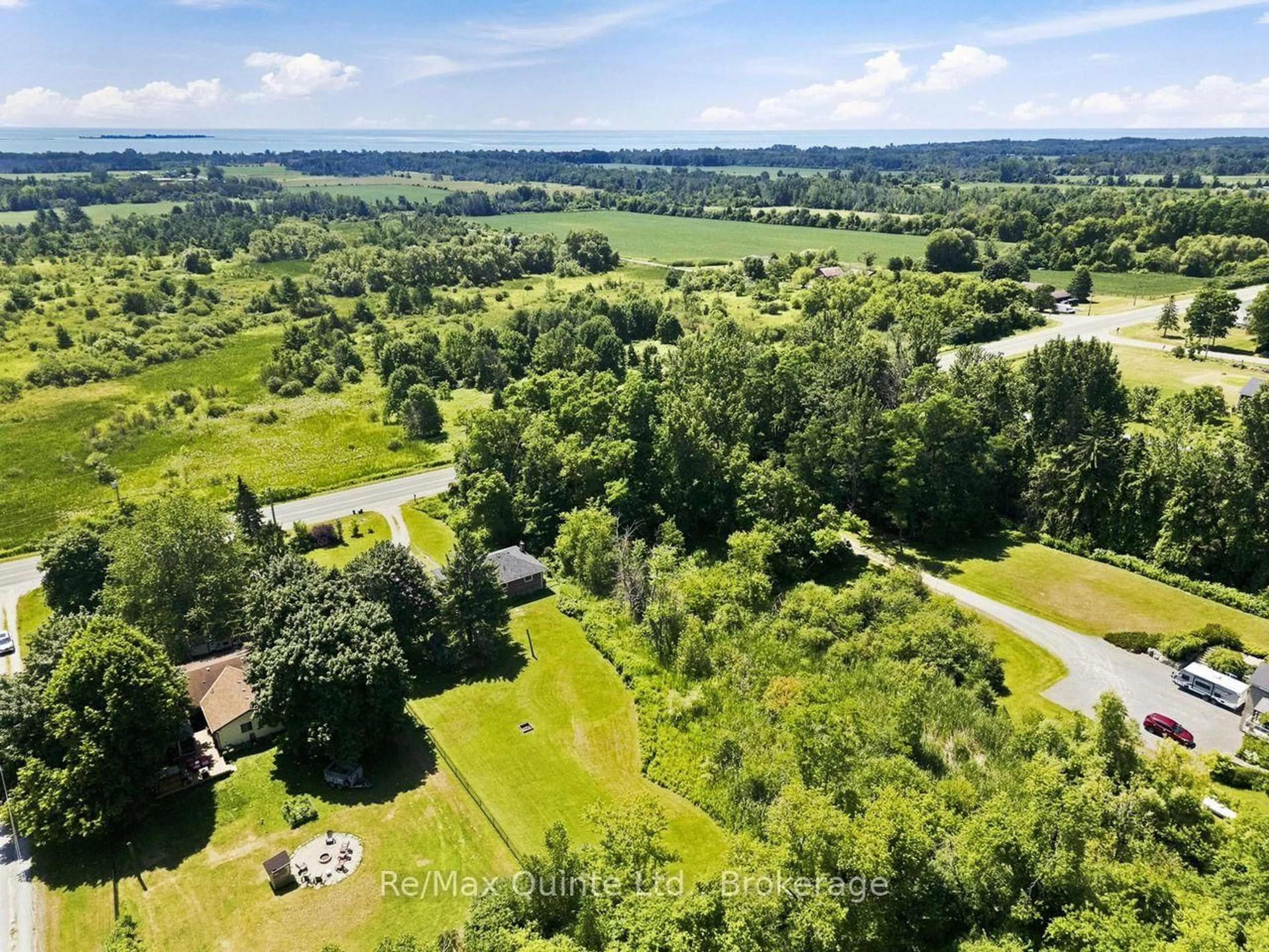 A pic from outside/outdoor area/front of a property/back of a property/a pic from drone, water/lake/river/ocean view for 15150 County Rd 2, Brighton Ontario K0K 1H0