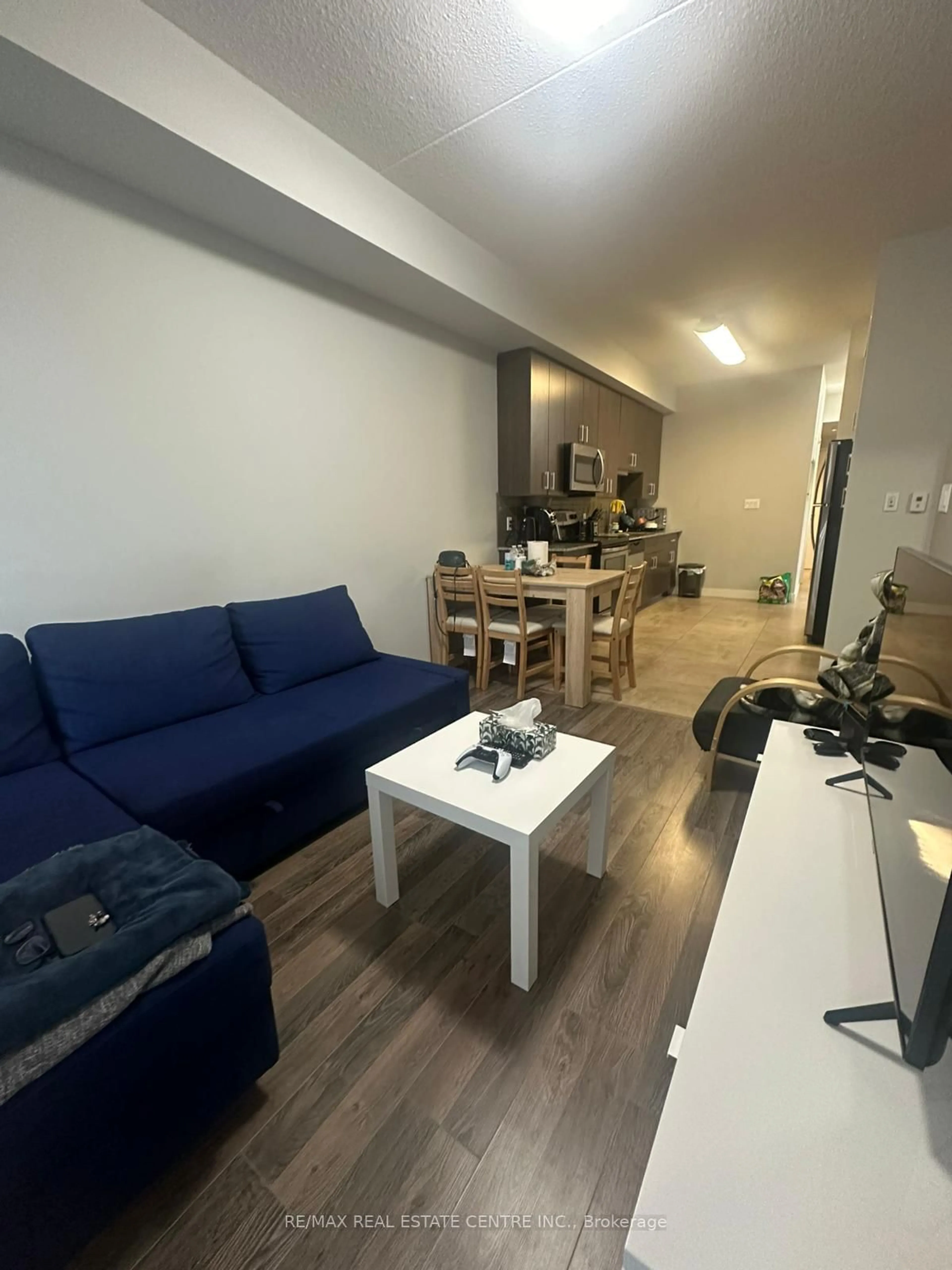 Living room with furniture, unknown for 62 Balsam B408 St, Waterloo Ontario N2L 3H2