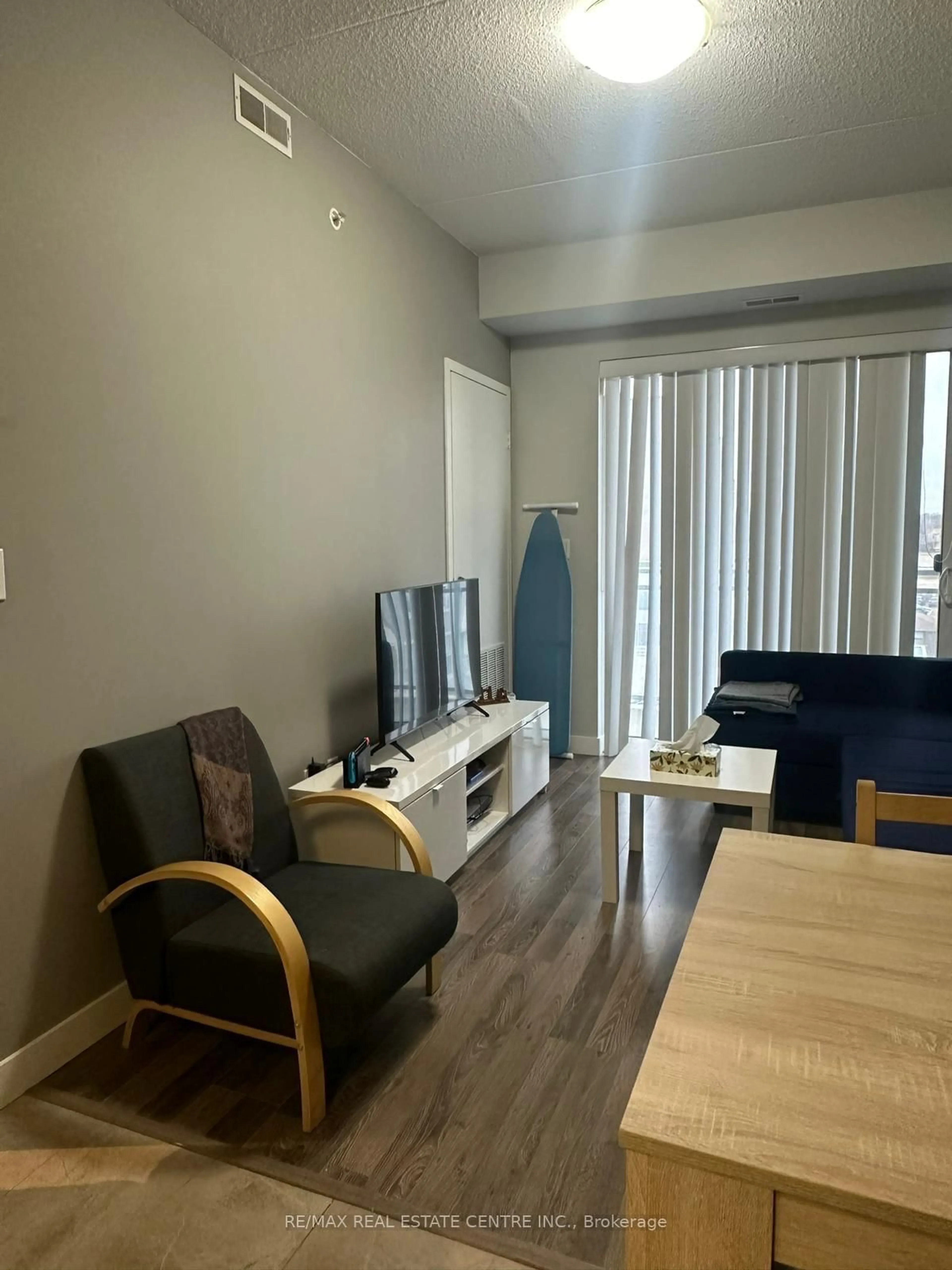 Living room with furniture, wood/laminate floor for 62 Balsam B408 St, Waterloo Ontario N2L 3H2