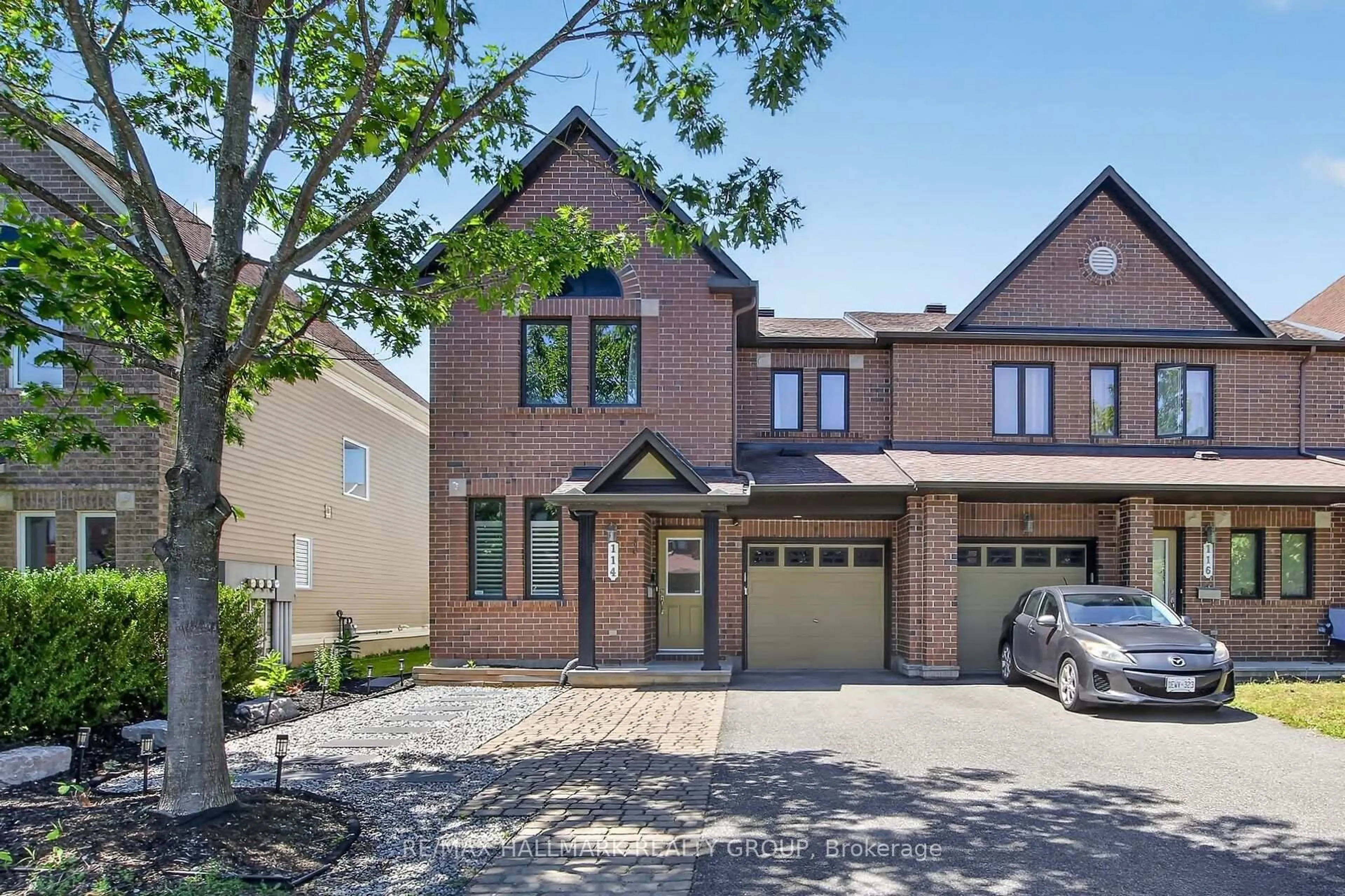 Home with brick exterior material, street for 114 Dunforest Terr, Ottawa Ontario K2J 3V1