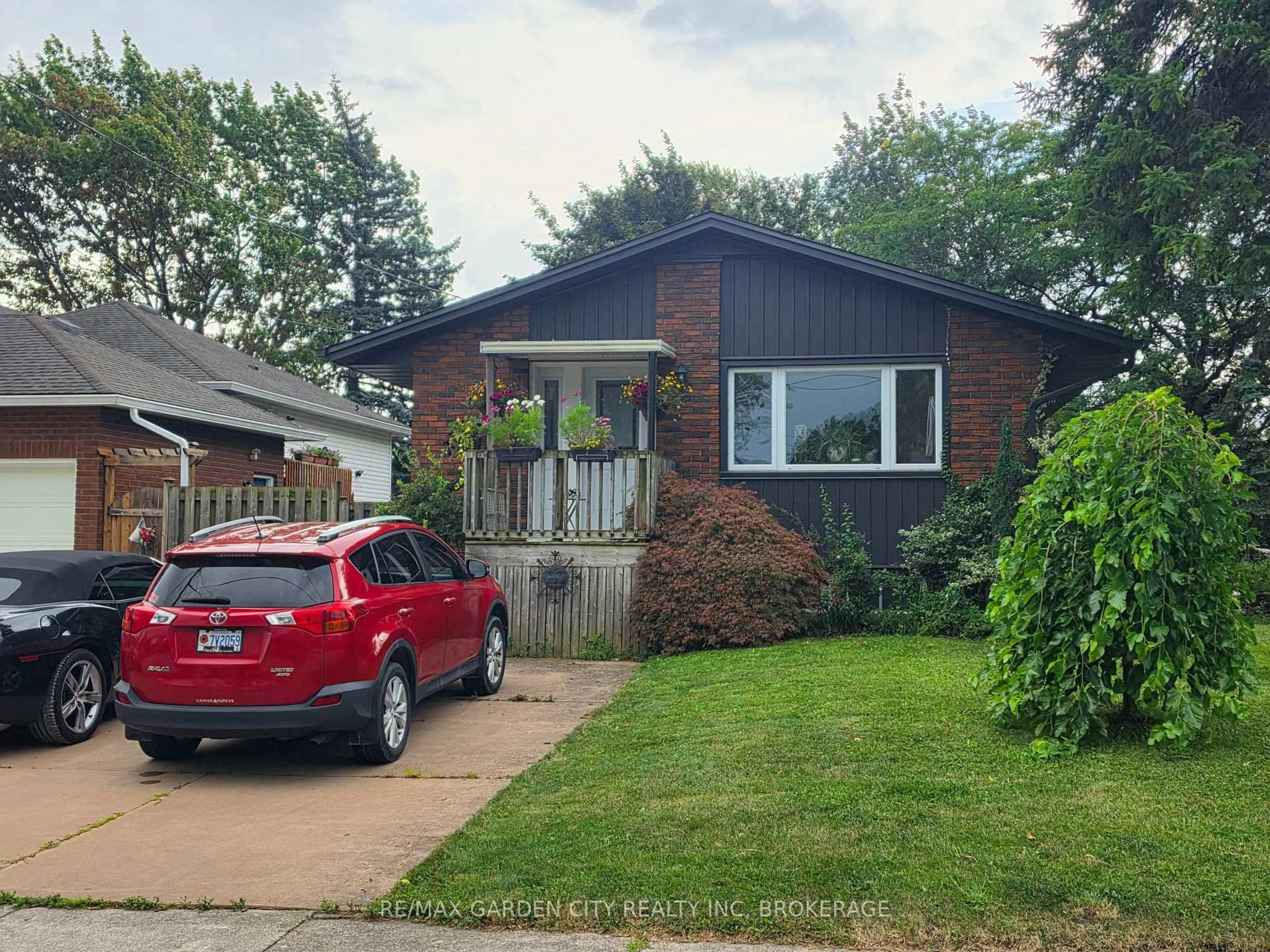 Home with brick exterior material, street for 49 Ursula Ave, St. Catharines Ontario L2T 1T2