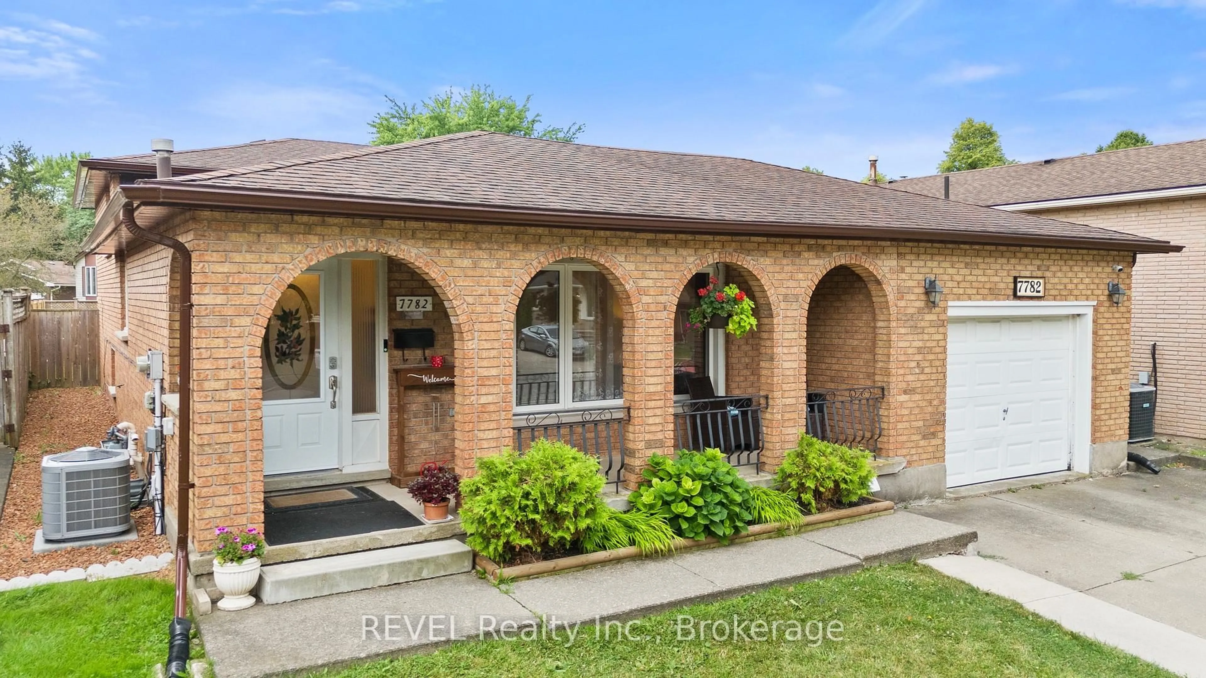 Home with brick exterior material, street for 7782 Badger Rd, Niagara Falls Ontario L2H 2J5
