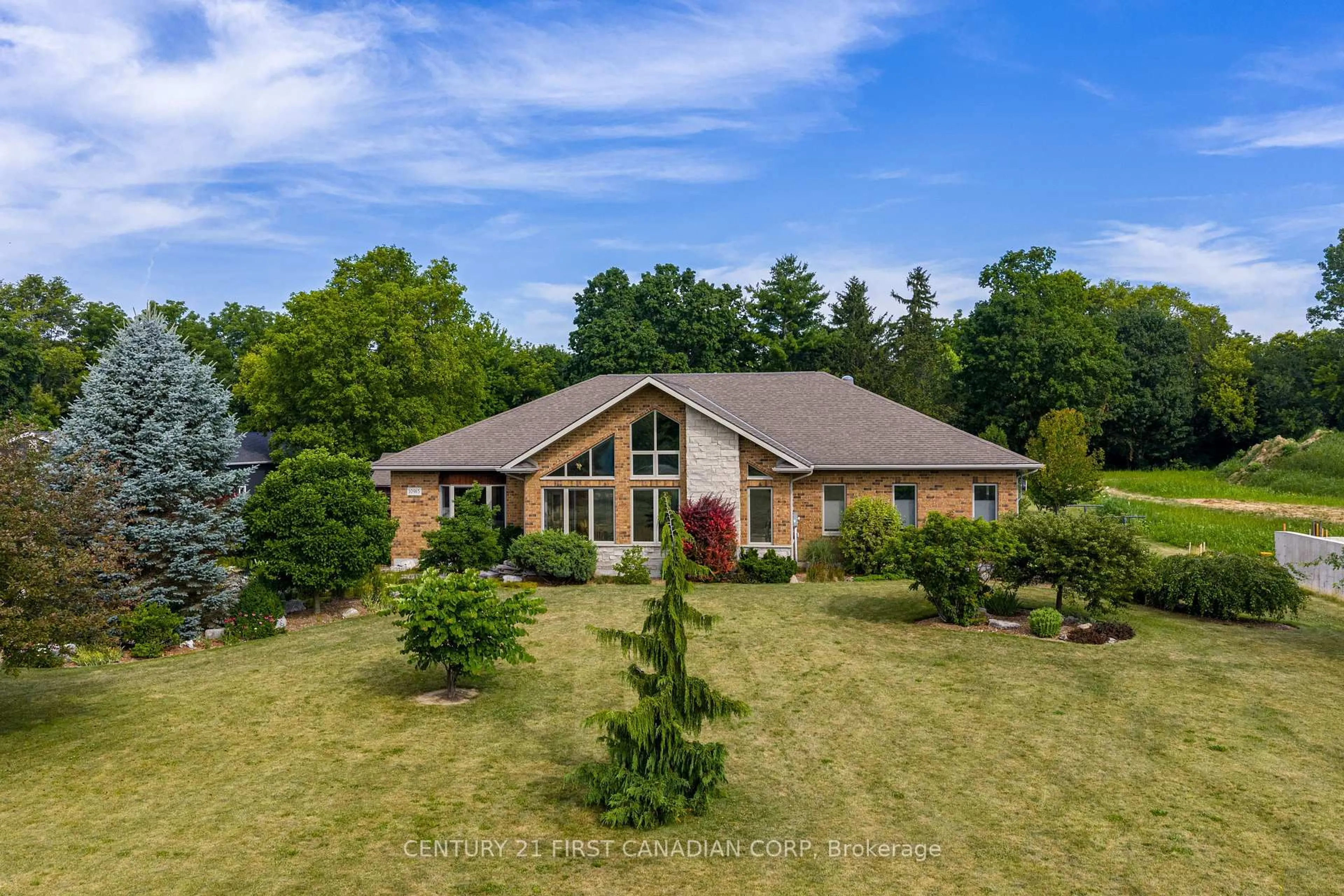 A pic from outside/outdoor area/front of a property/back of a property/a pic from drone, water/lake/river/ocean view for 10965 River Line, Chatham-Kent Ontario N7M 5J4