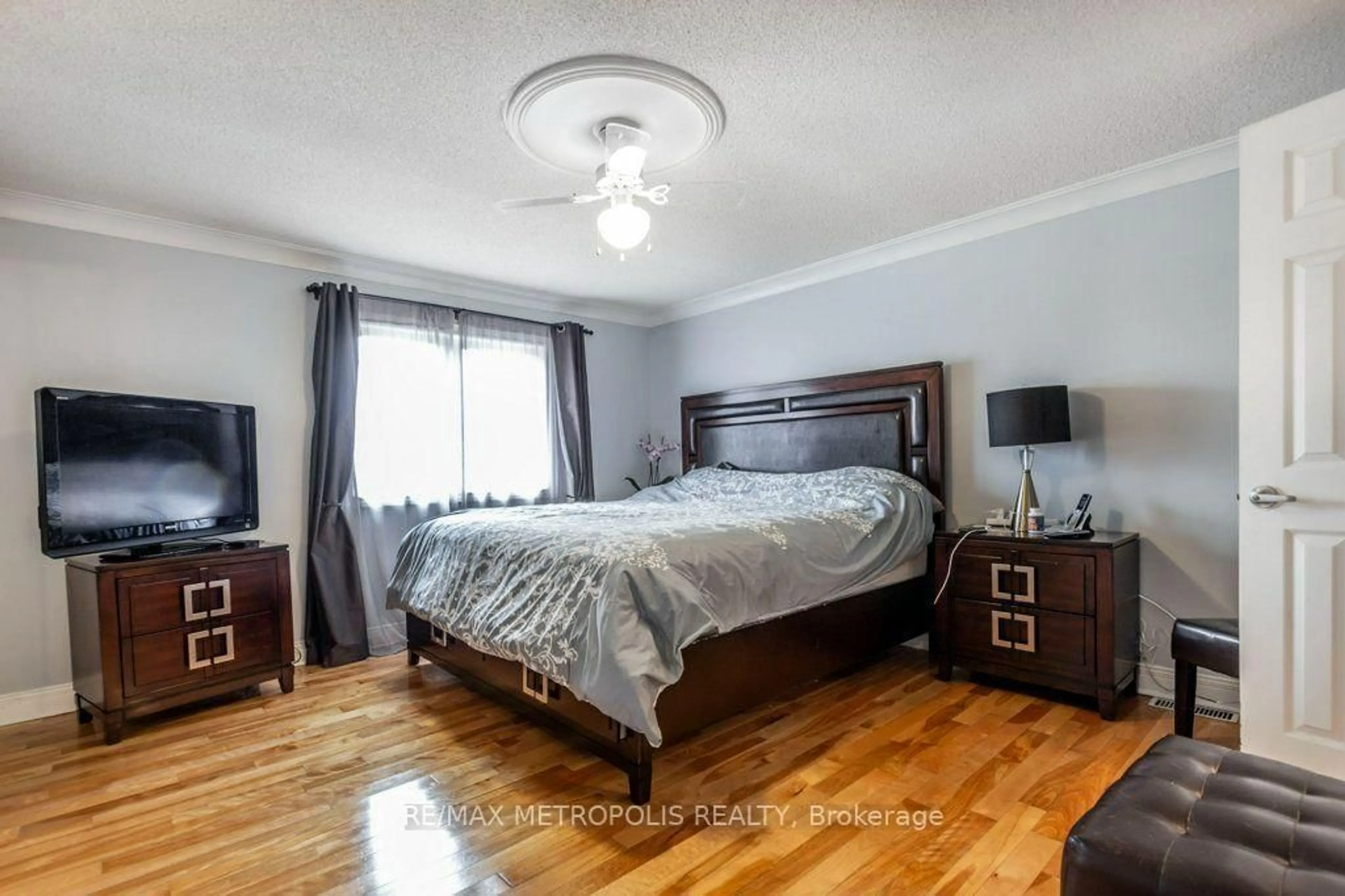 Bedroom with bed, wood/laminate floor for 269 Burnett Ave, Cambridge Ontario N1T 1E8
