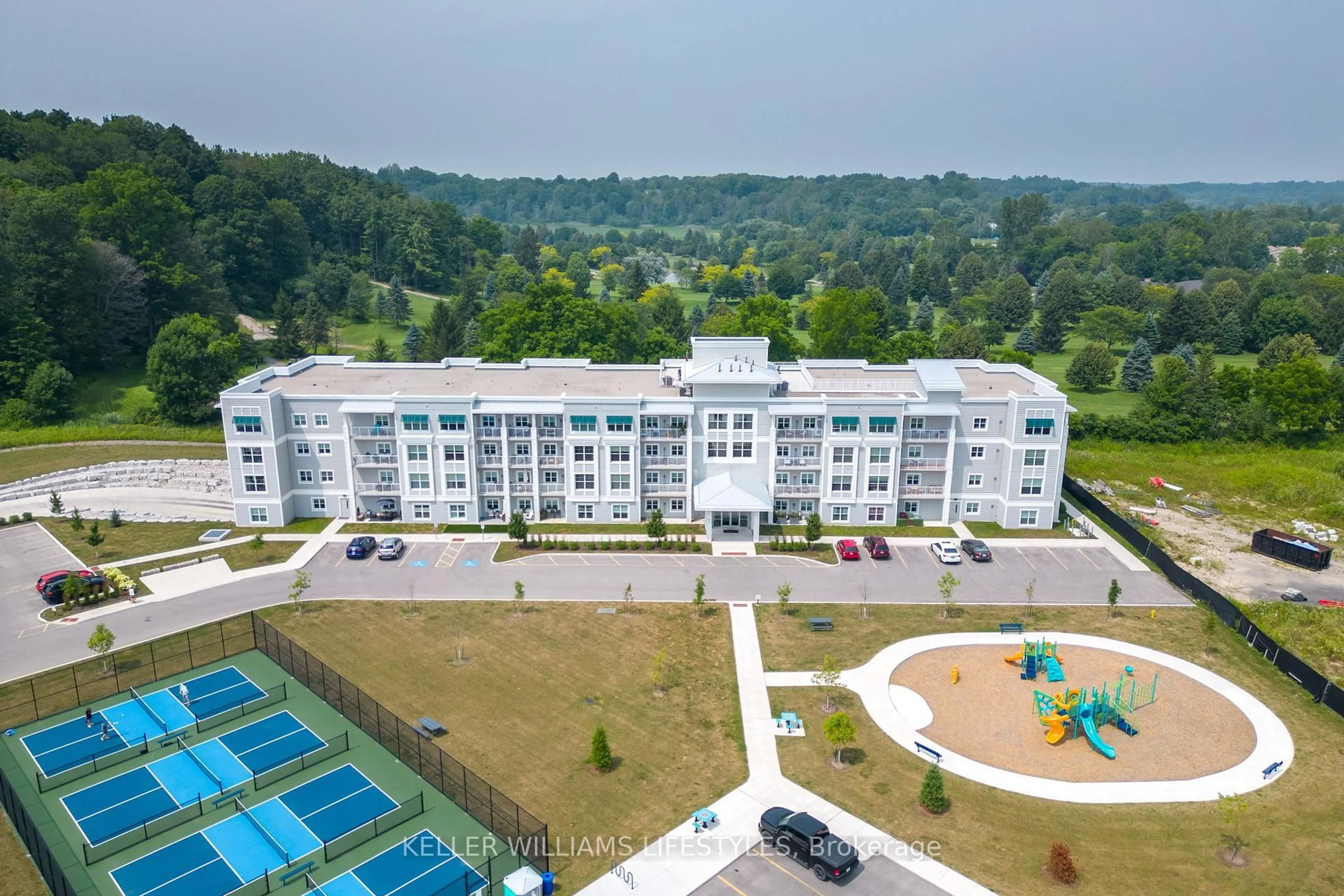 A pic from outside/outdoor area/front of a property/back of a property/a pic from drone, building for 100 The Prom #103, Central Elgin Ontario N5L 1C5