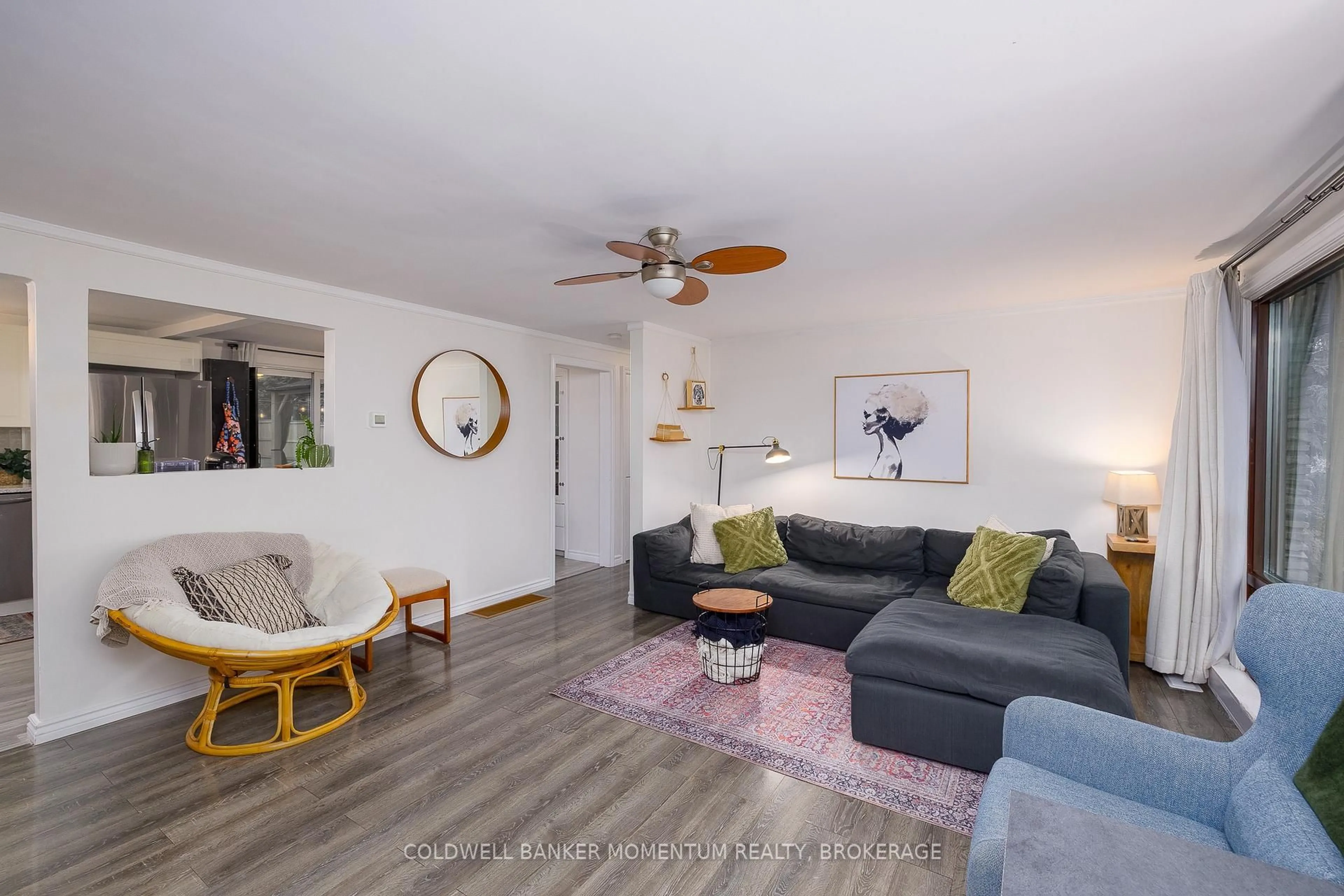 Living room with furniture, wood/laminate floor for 458 Belleview Blvd, Fort Erie Ontario L0S 1N0