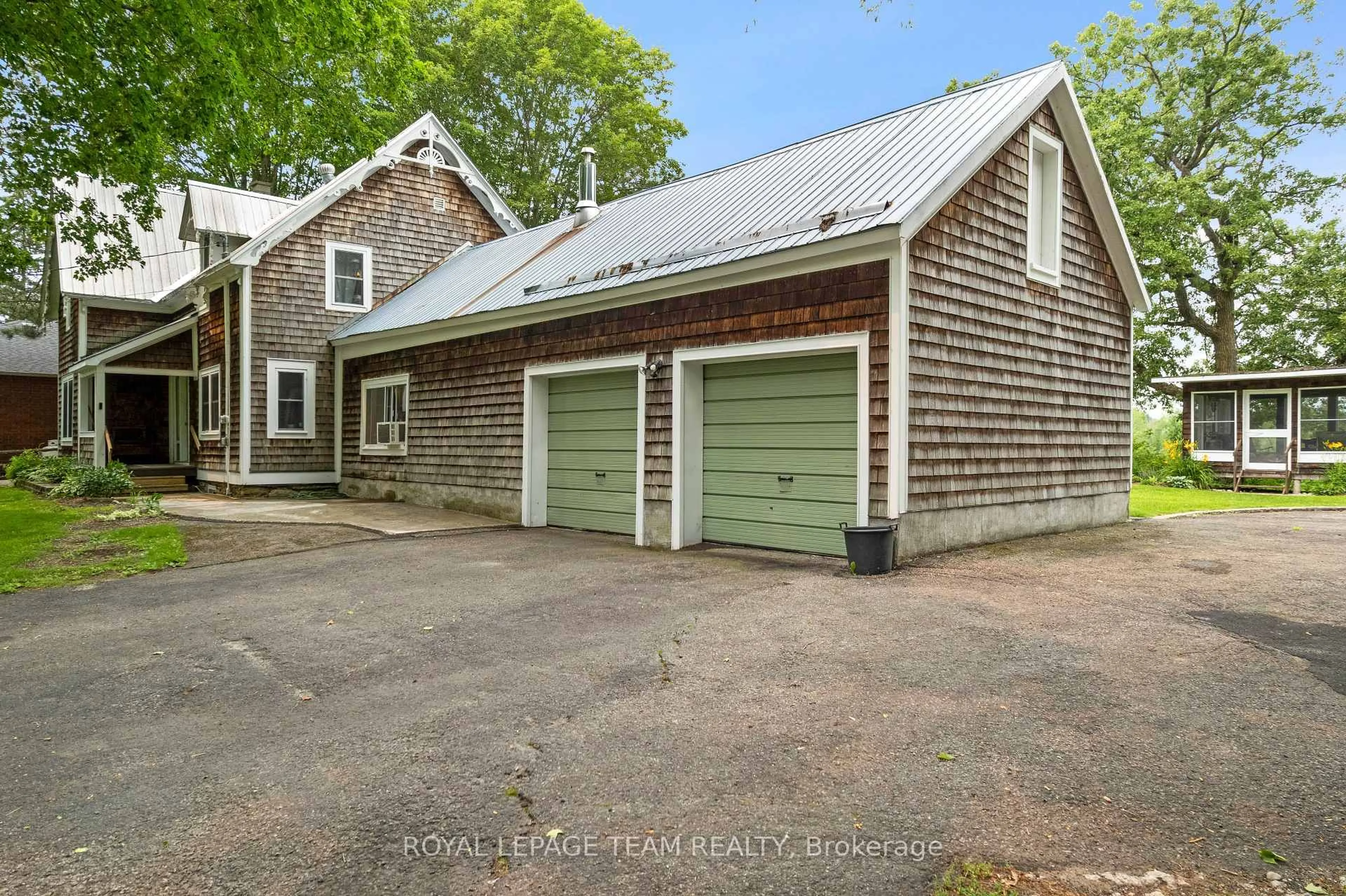 A pic from outside/outdoor area/front of a property/back of a property/a pic from drone, street for 715 River Rd, North Grenville Ontario K0G 1J0