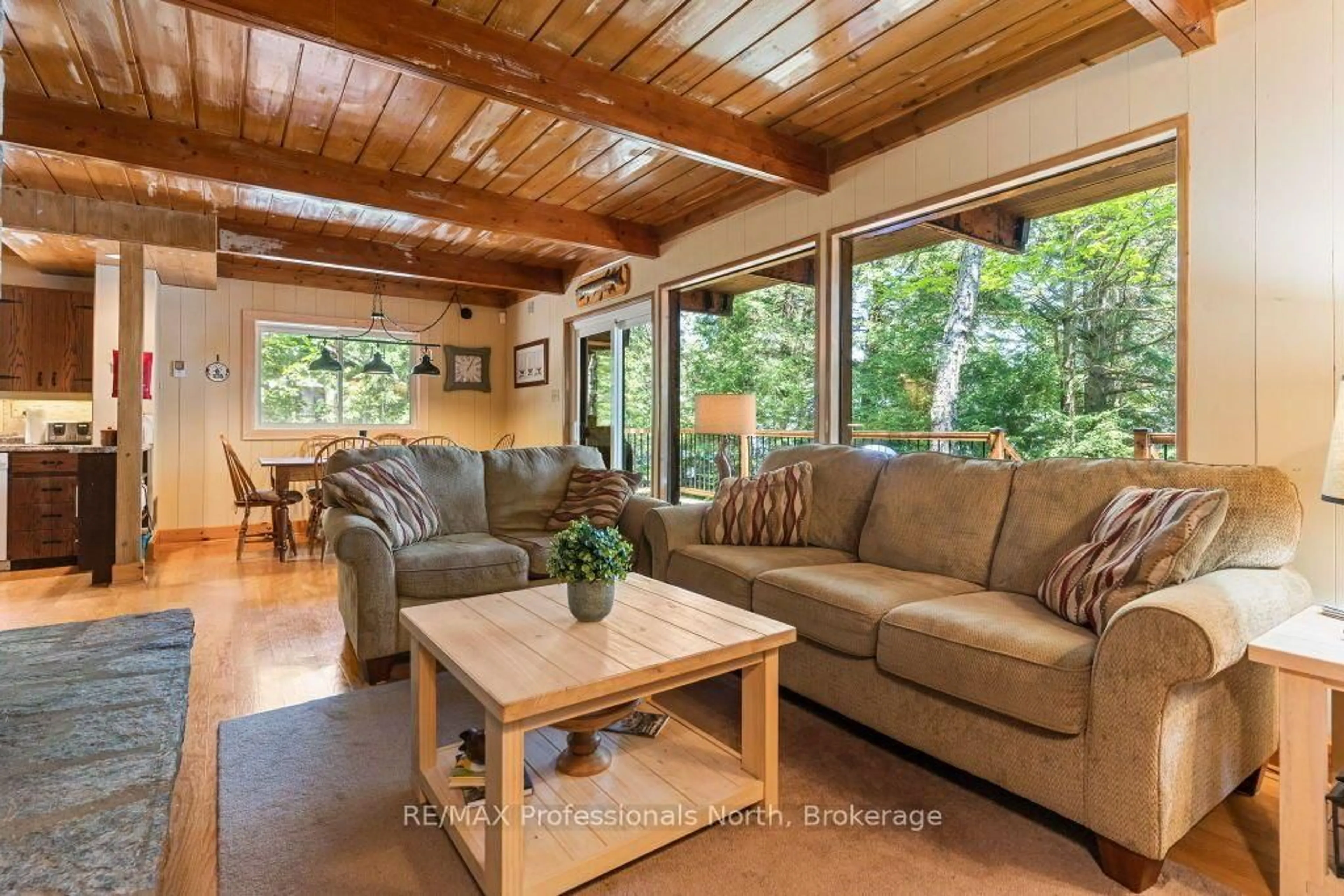Living room with furniture, wood/laminate floor for 1540 Parsons Rd, Dysart et al Ontario K0M 1S0