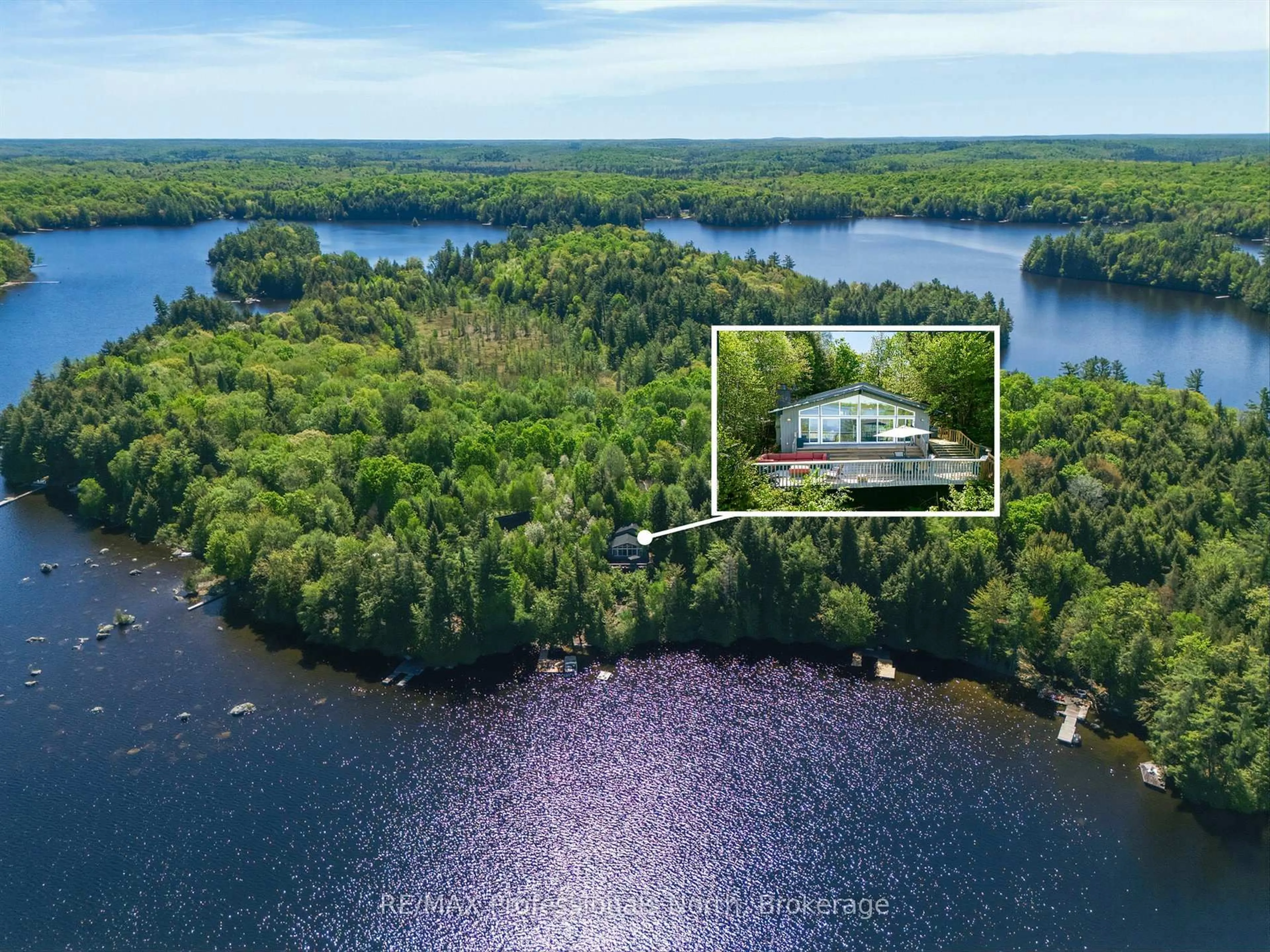 A pic from outside/outdoor area/front of a property/back of a property/a pic from drone, water/lake/river/ocean view for 20 Macbeth Island, Bracebridge Ontario P1L 1X3