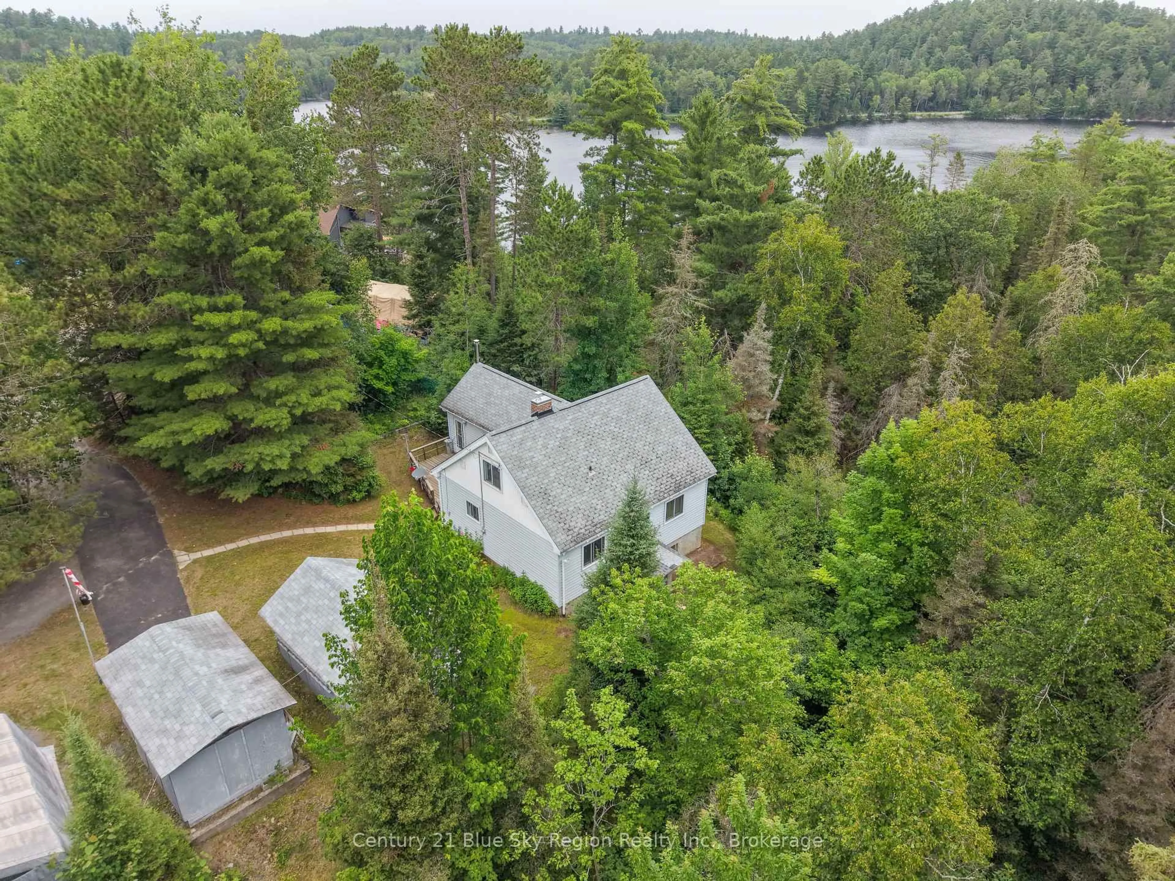 A pic from outside/outdoor area/front of a property/back of a property/a pic from drone, water/lake/river/ocean view for 73 O'Connor Dr, Temagami Ontario P0H 2H0