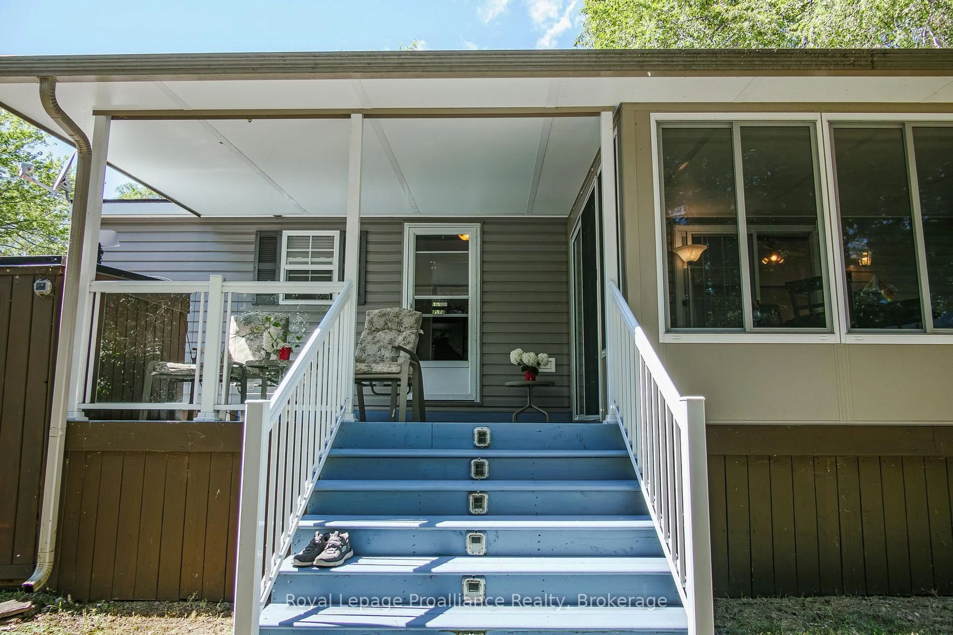 Home with vinyl exterior material, street for 486 Cty Rd 18 - 5 Cove Bay Lane, Prince Edward County Ontario K0K 1P0