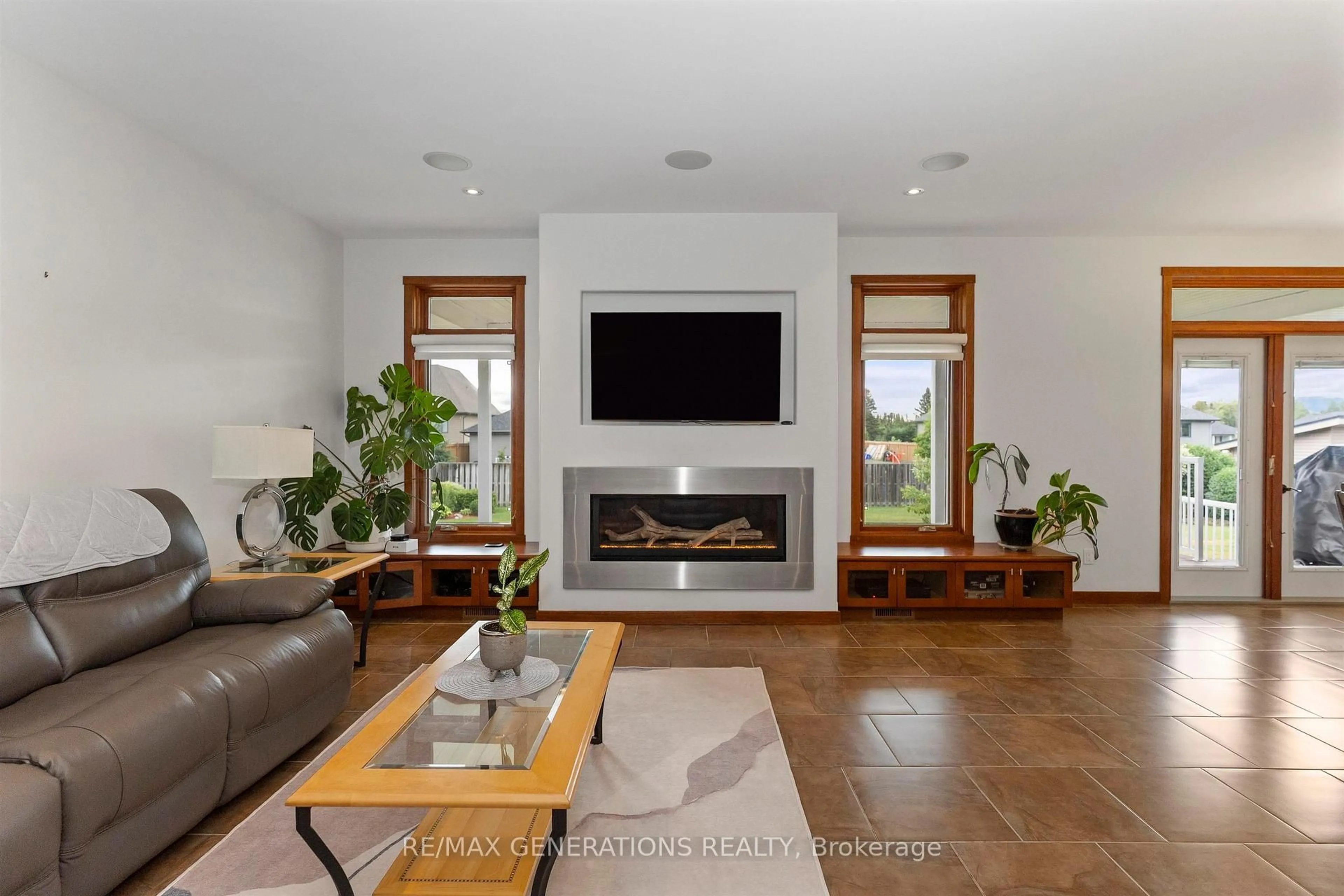 Living room with furniture, ceramic/tile floor for 1106 MAHOGANY Pl, Thunder Bay Ontario P7K 0A3