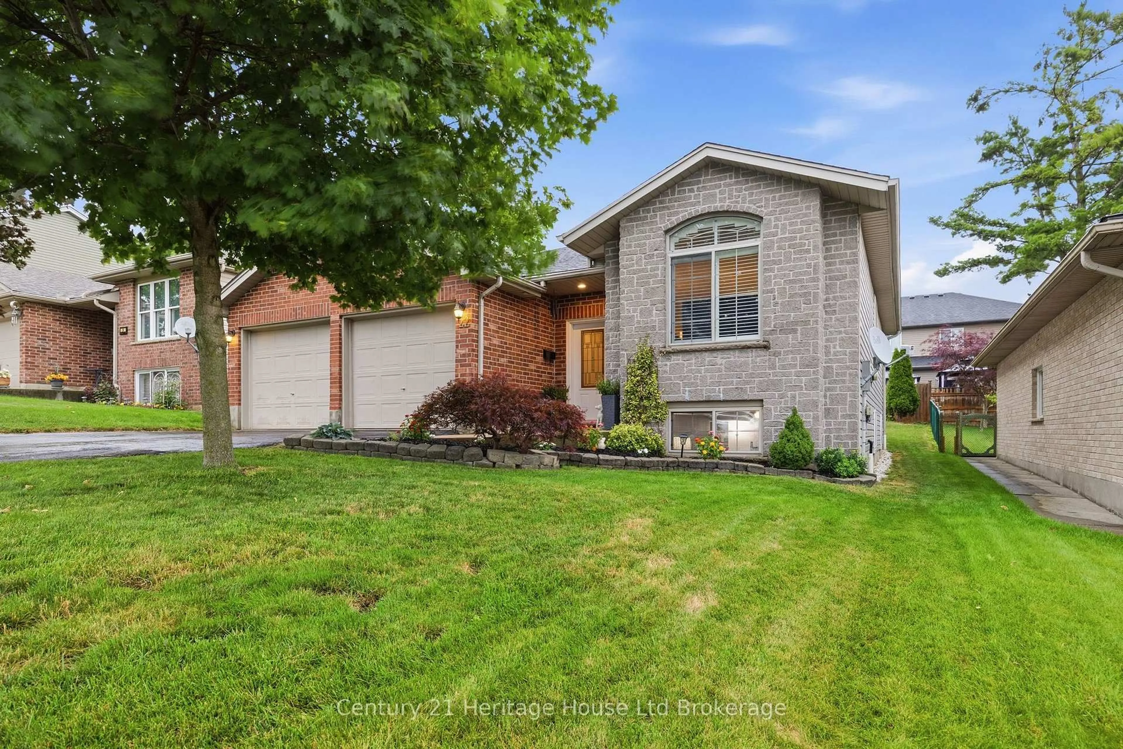 Home with brick exterior material, street for 22 Hillside Rd, Ingersoll Ontario N5C 4B5