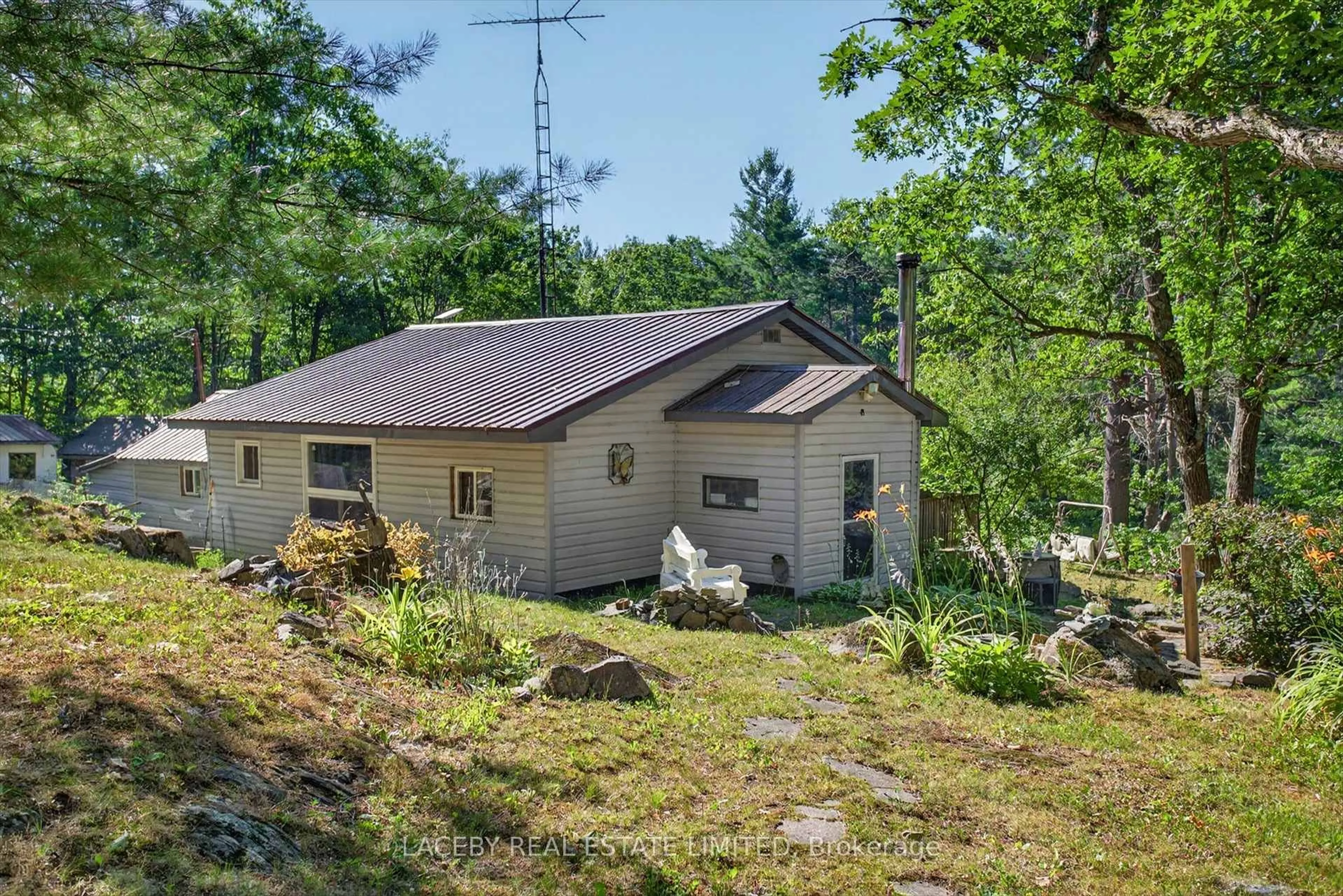 A pic from outside/outdoor area/front of a property/back of a property/a pic from drone, unknown for 21 Fire Route 70, Havelock-Belmont-Methuen Ontario K0L 1Z0