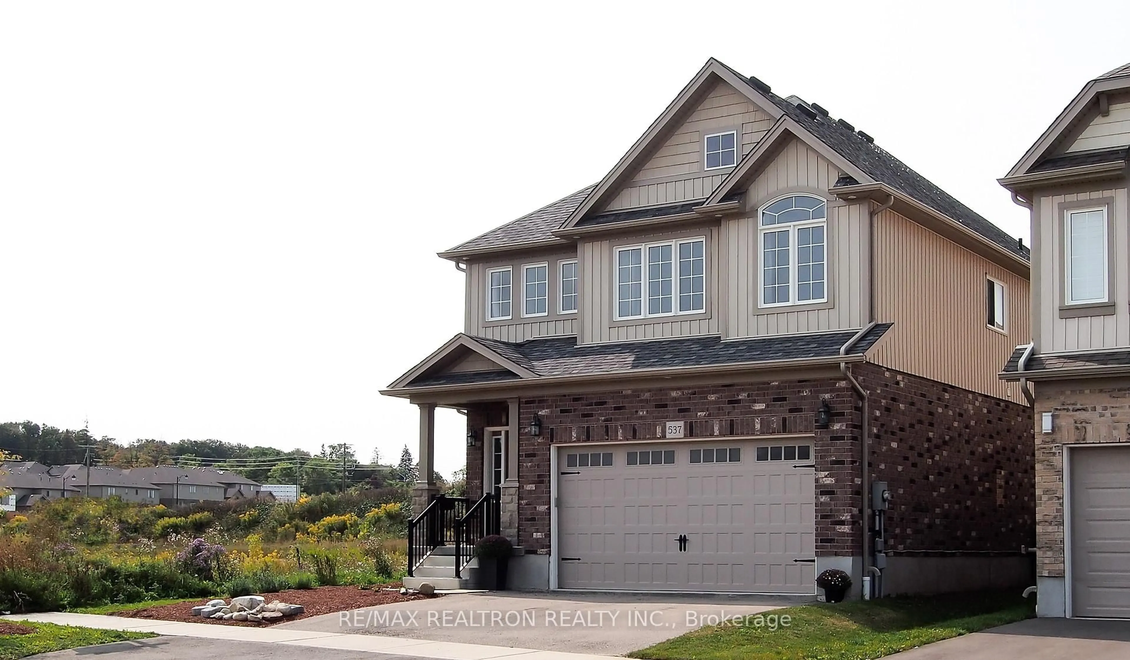 Home with brick exterior material, street for 537 Sundew Dr, Waterloo Ontario N2V 0B8