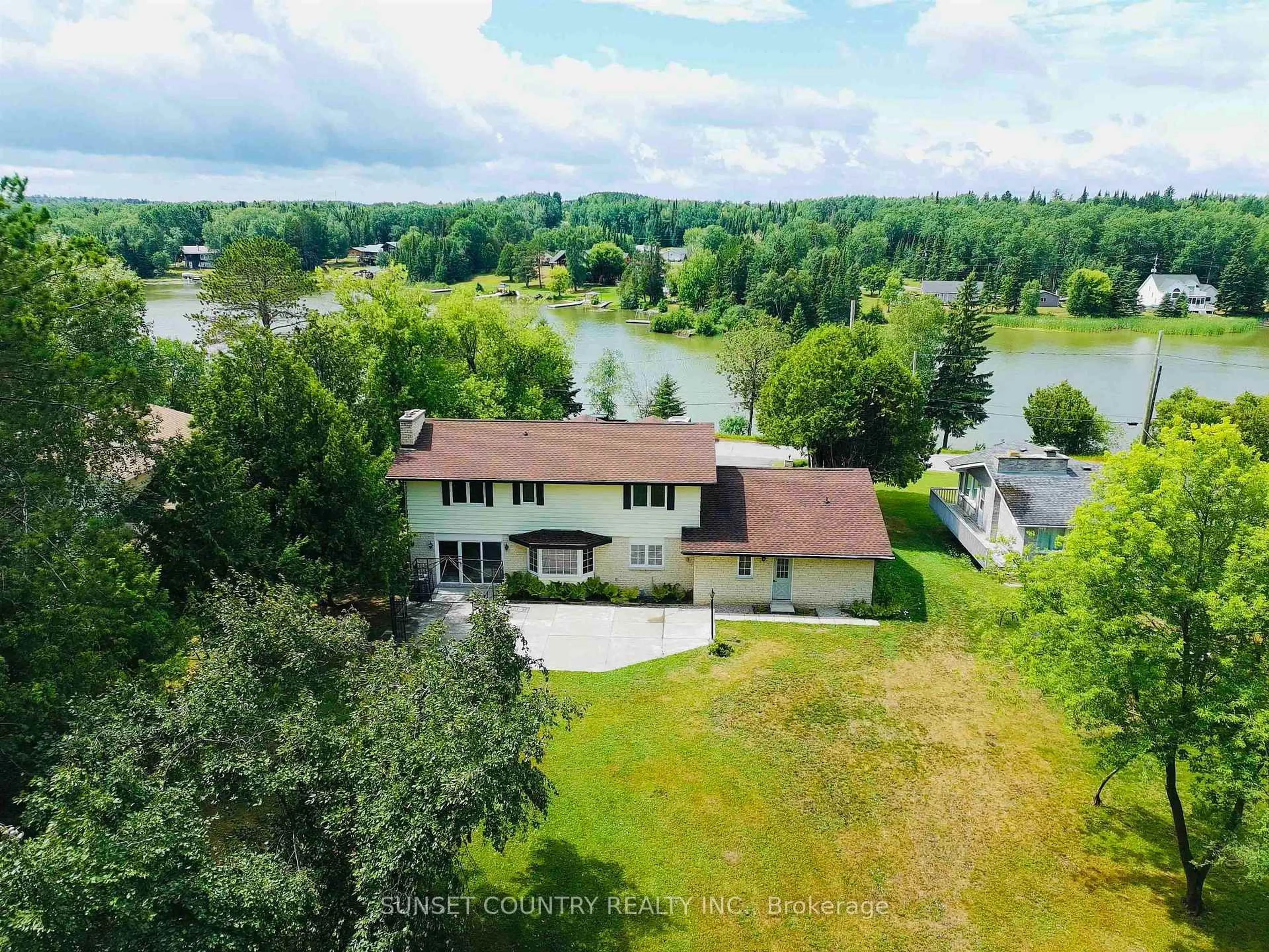 A pic from outside/outdoor area/front of a property/back of a property/a pic from drone, water/lake/river/ocean view for 253 Riverview Dr, Dryden Ontario P8N 1W7