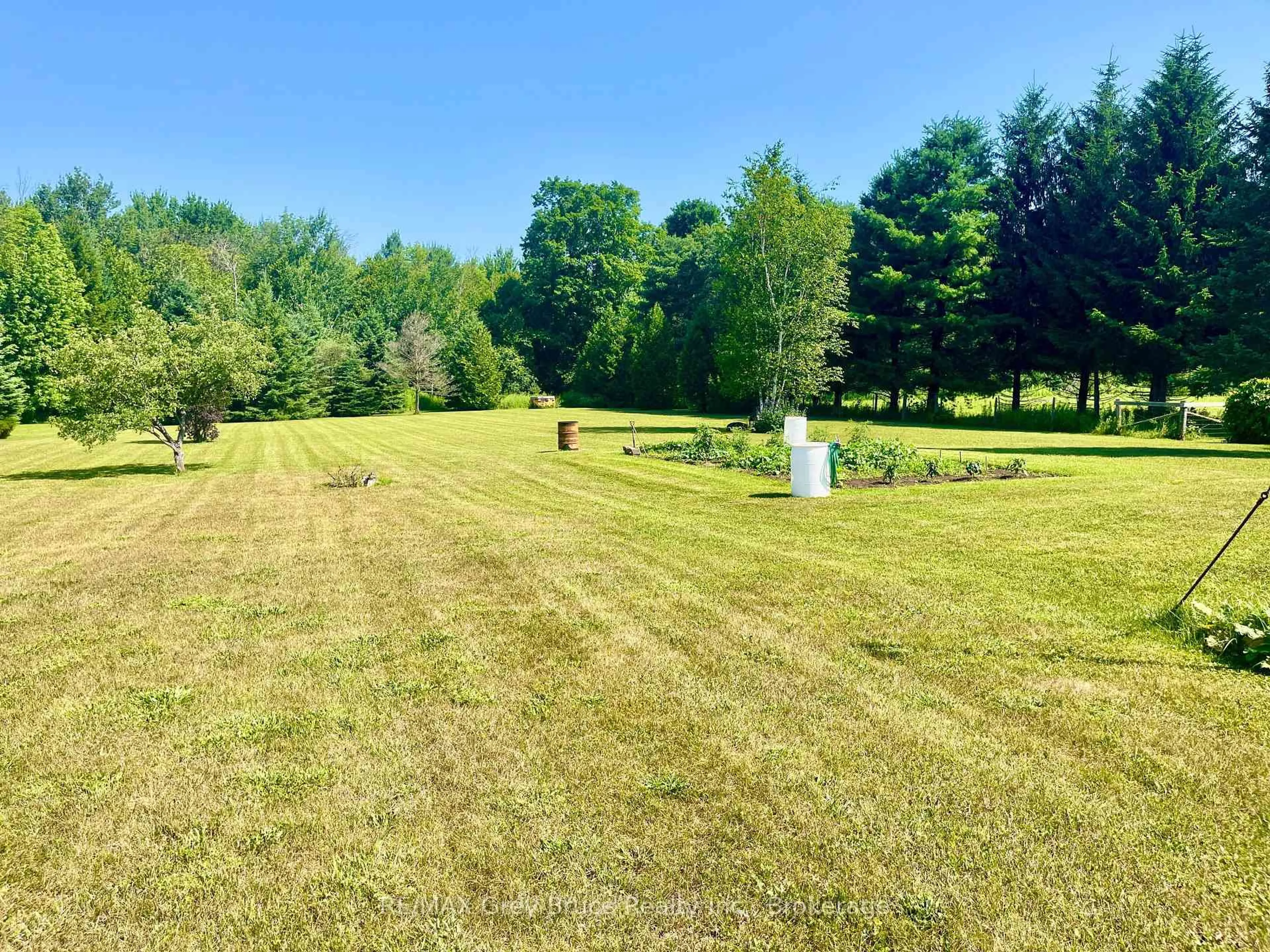 A pic from outside/outdoor area/front of a property/back of a property/a pic from drone, forest/trees view for 023037 Holland-Sydenham Townline, Meaford Ontario N0H 1G0