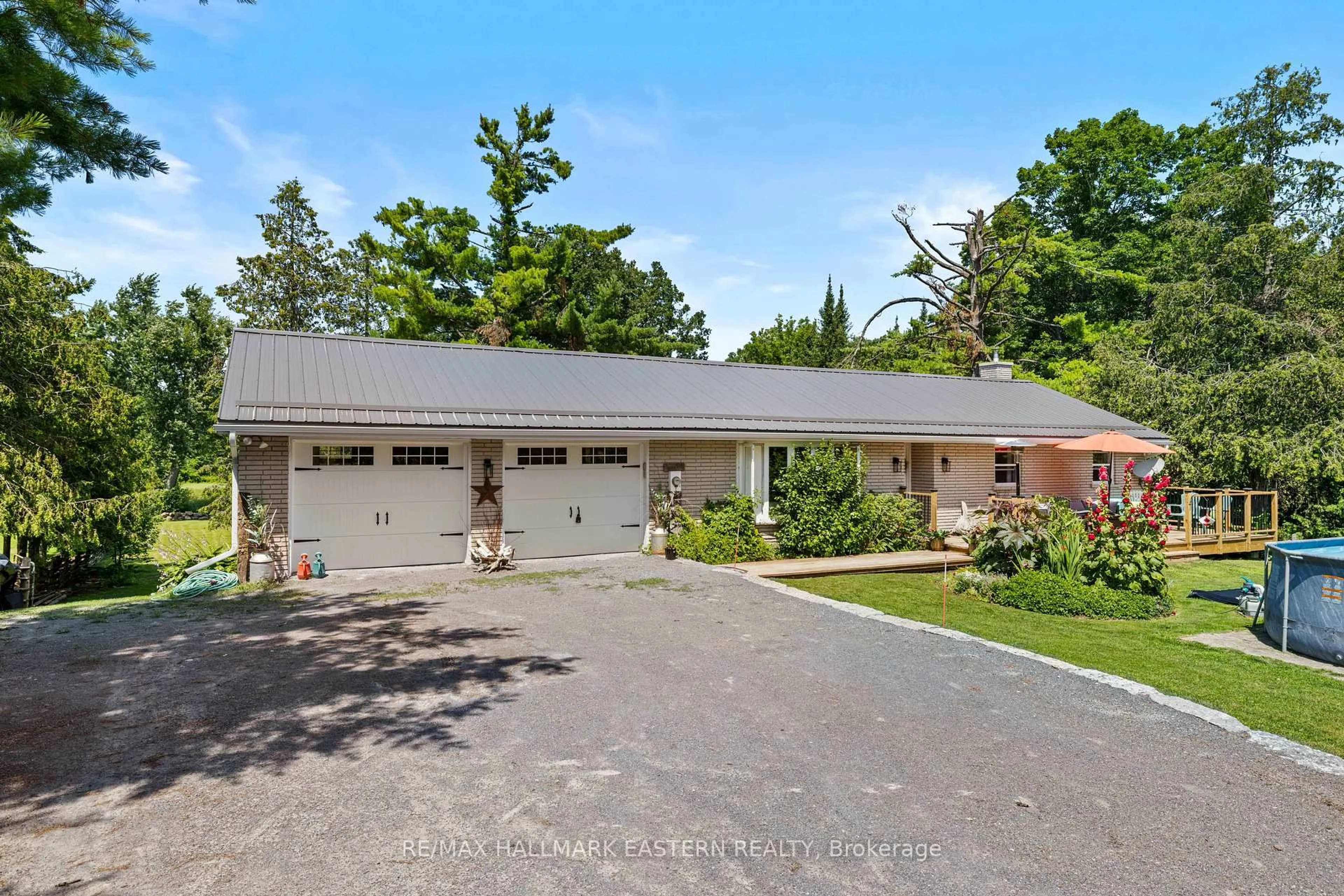 A pic from outside/outdoor area/front of a property/back of a property/a pic from drone, street for 2694 County Road 6, Douro-Dummer Ontario K0L 2H0