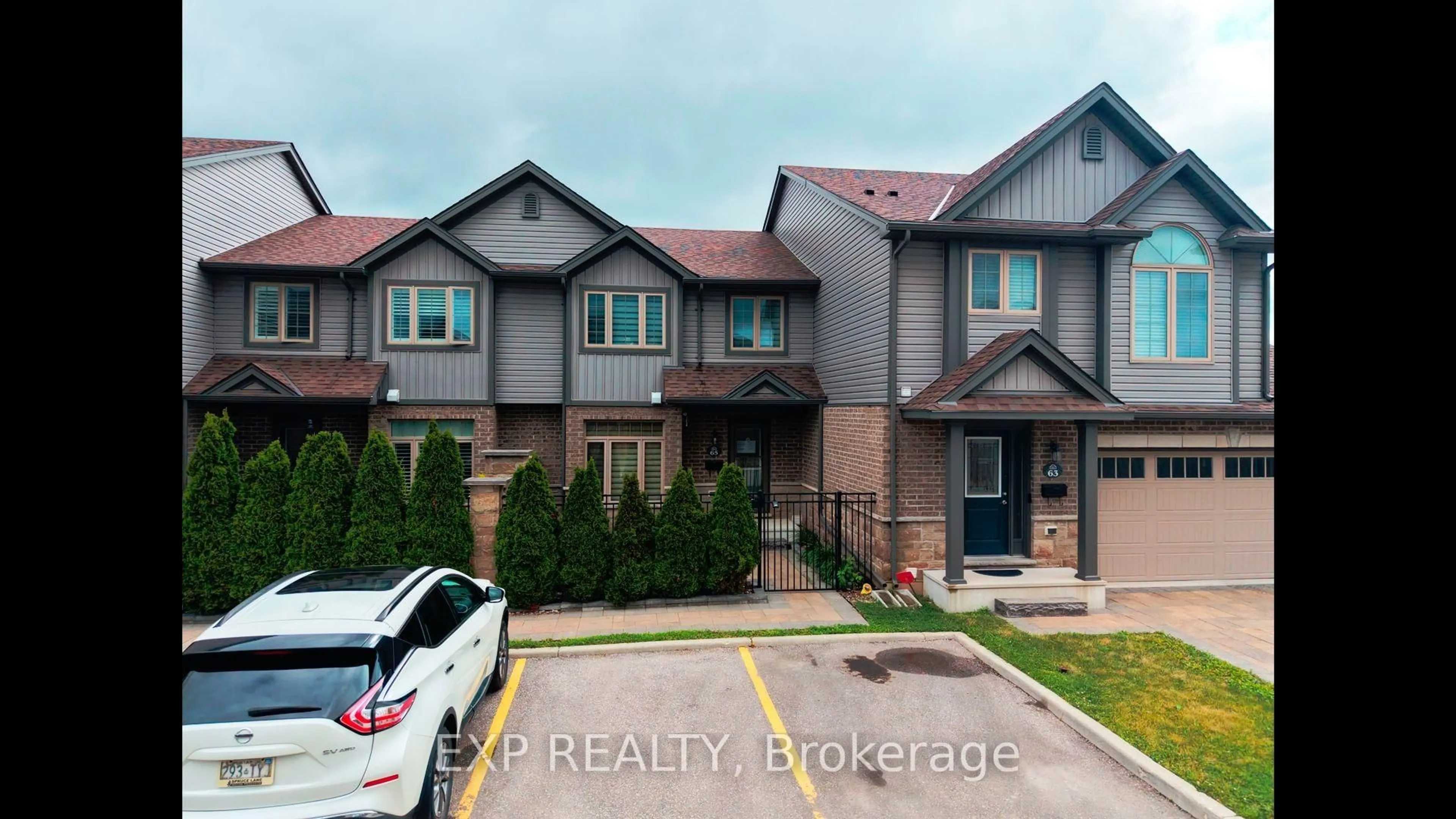 A pic from outside/outdoor area/front of a property/back of a property/a pic from drone, street for 3400 Castle Rock Pl #65, London South Ontario N6L 0E4