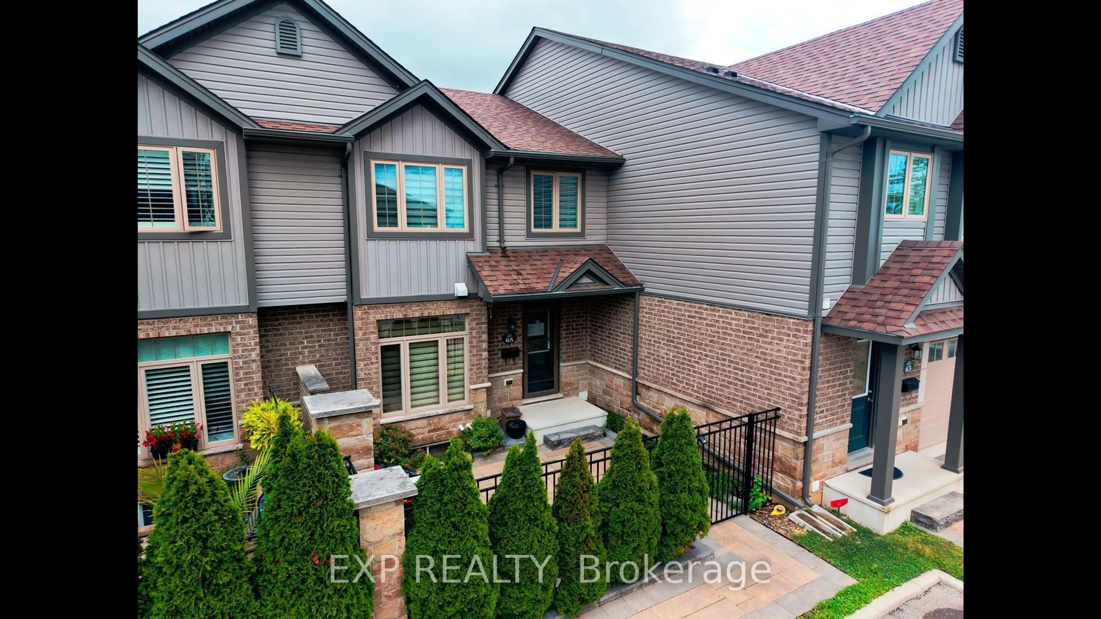 A pic from outside/outdoor area/front of a property/back of a property/a pic from drone, street for 3400 Castle Rock Pl #65, London South Ontario N6L 0E4