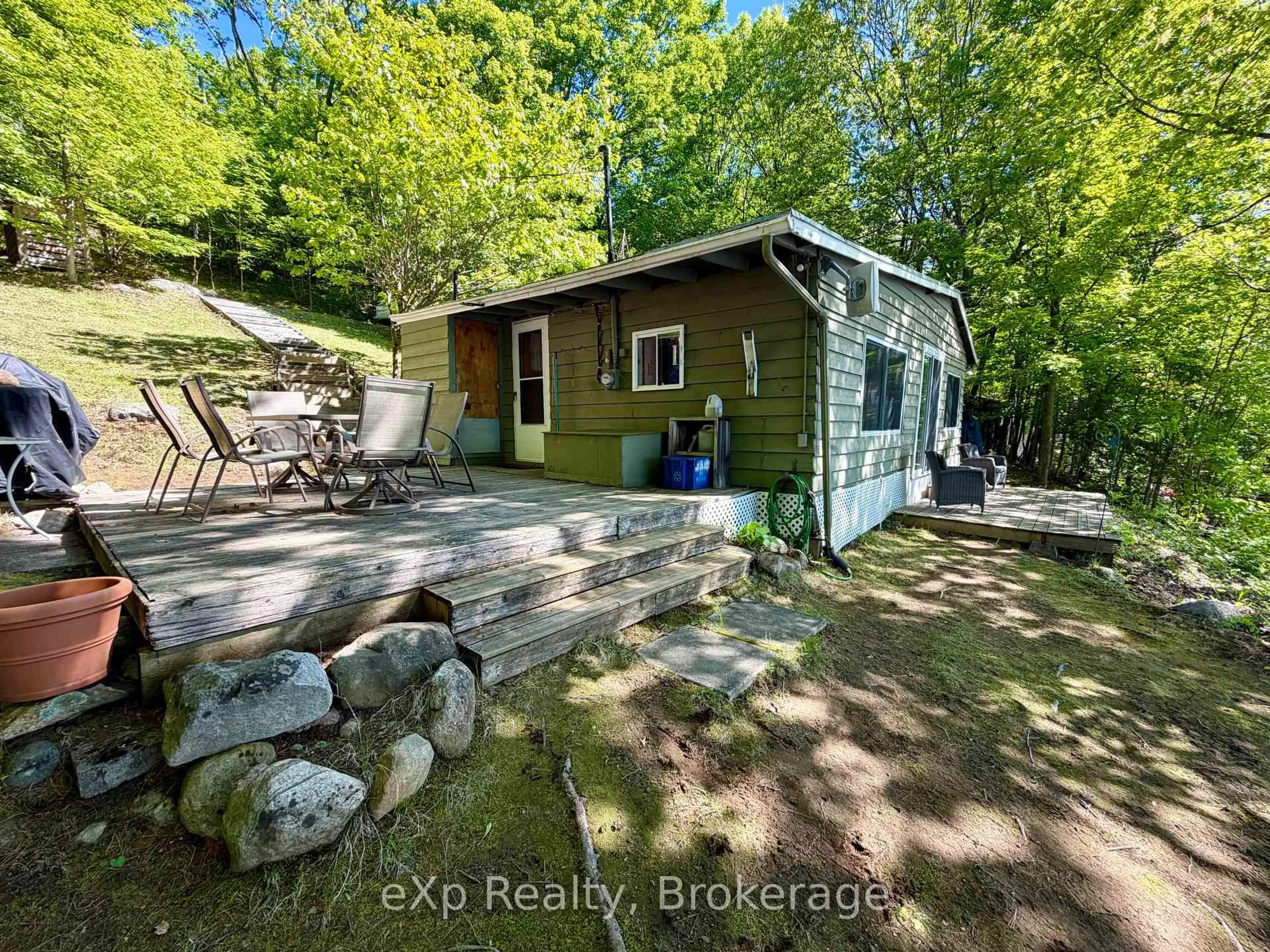 A pic from outside/outdoor area/front of a property/back of a property/a pic from drone, water/lake/river/ocean view for 1082 Cowan Park Rd #3, Muskoka Lakes Ontario P0B 1M0