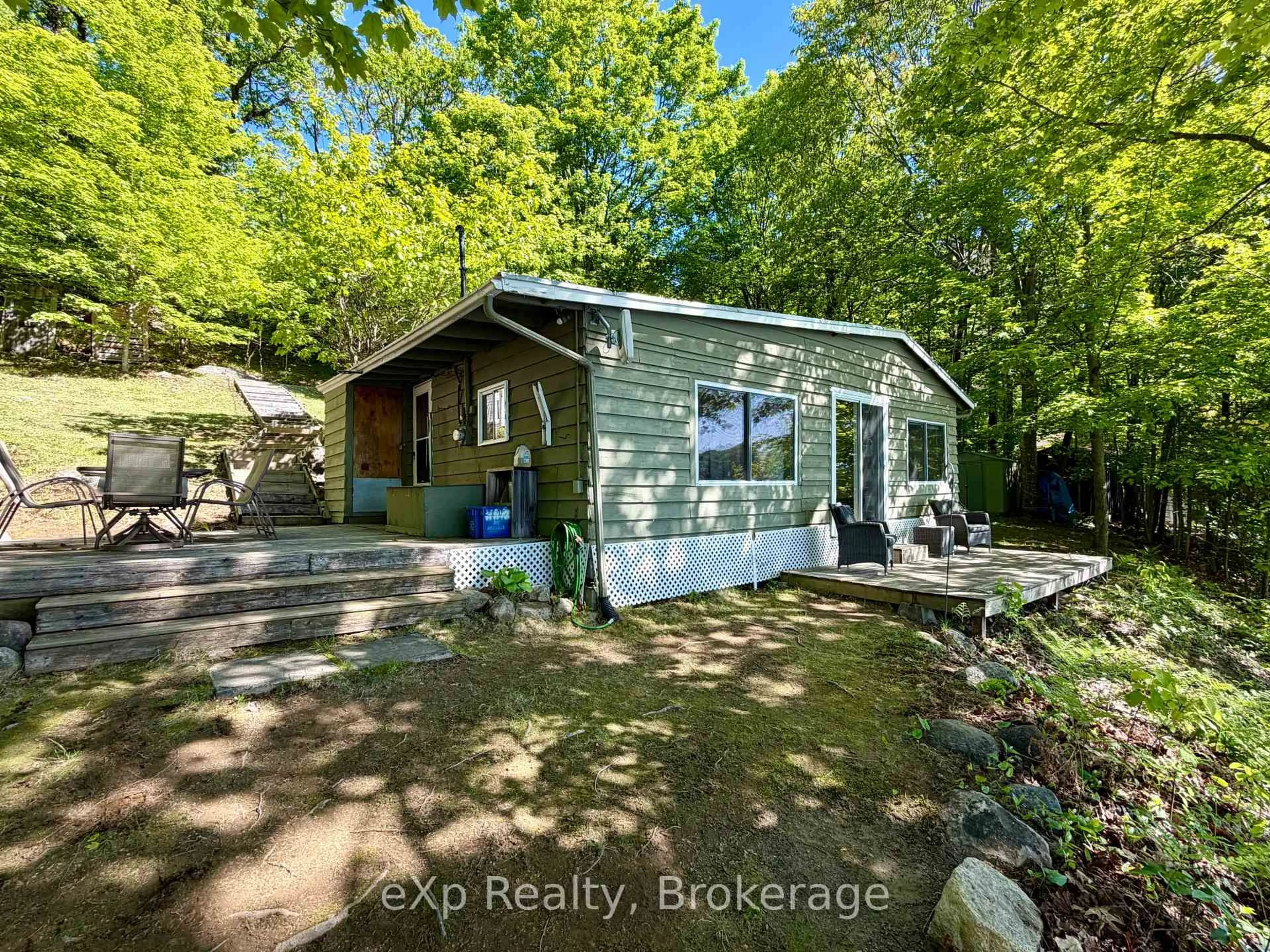 A pic from outside/outdoor area/front of a property/back of a property/a pic from drone, water/lake/river/ocean view for 1082 Cowan Park Rd #3, Muskoka Lakes Ontario P0B 1M0