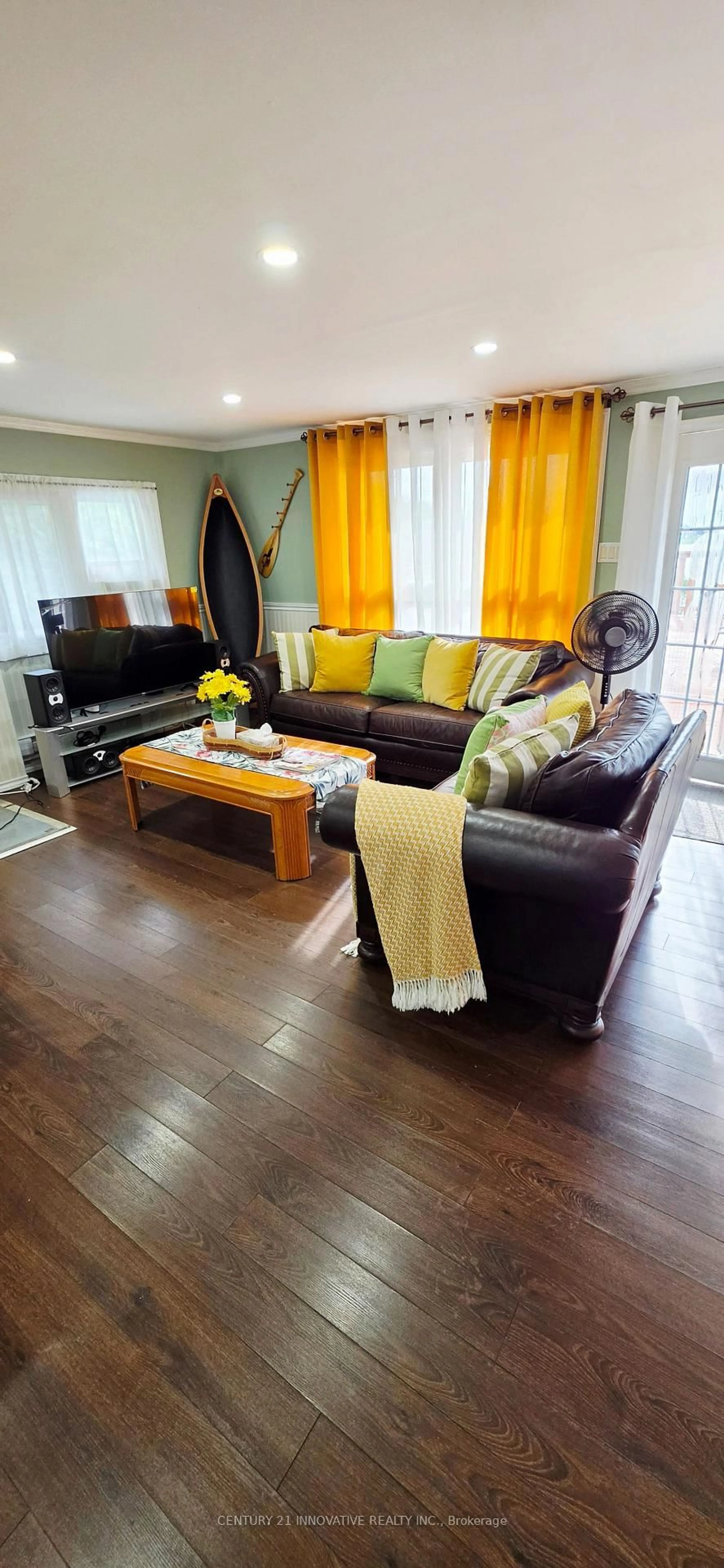 Living room with furniture, wood/laminate floor for 73 Loon St, Kawartha Lakes Ontario L0B 1K0