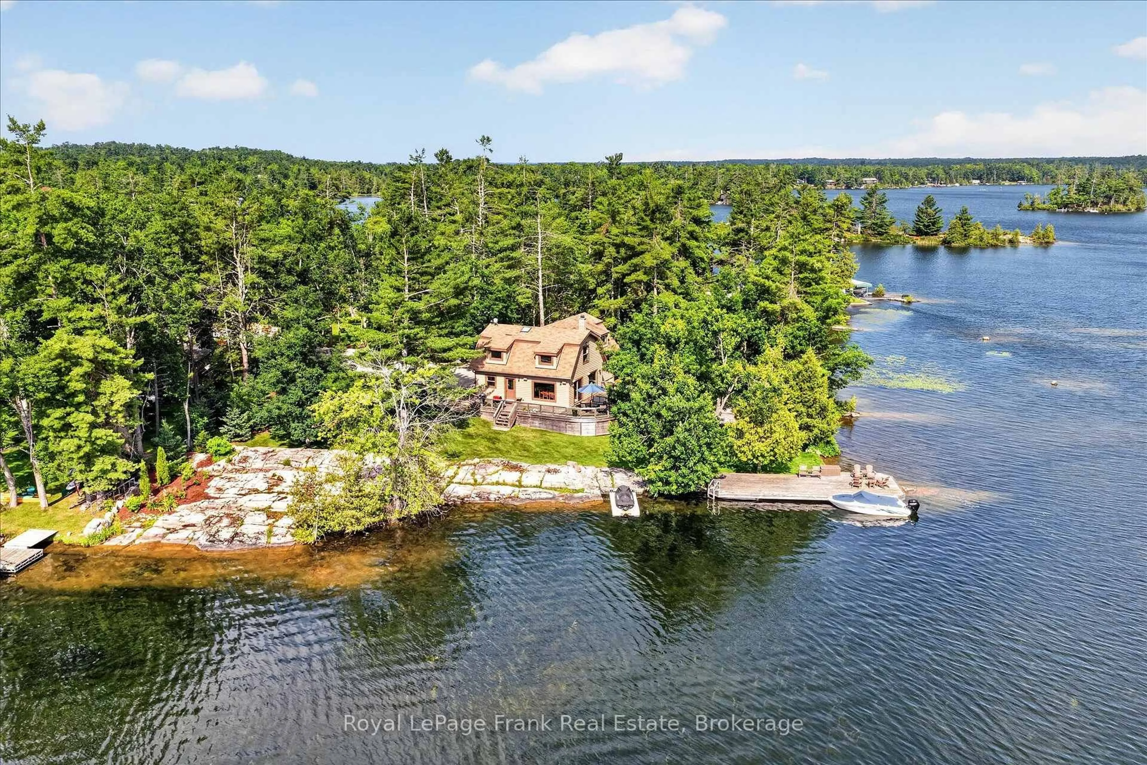 A pic from outside/outdoor area/front of a property/back of a property/a pic from drone, water/lake/river/ocean view for 124 Irwin Dr, Trent Lakes Ontario K0L 1J0
