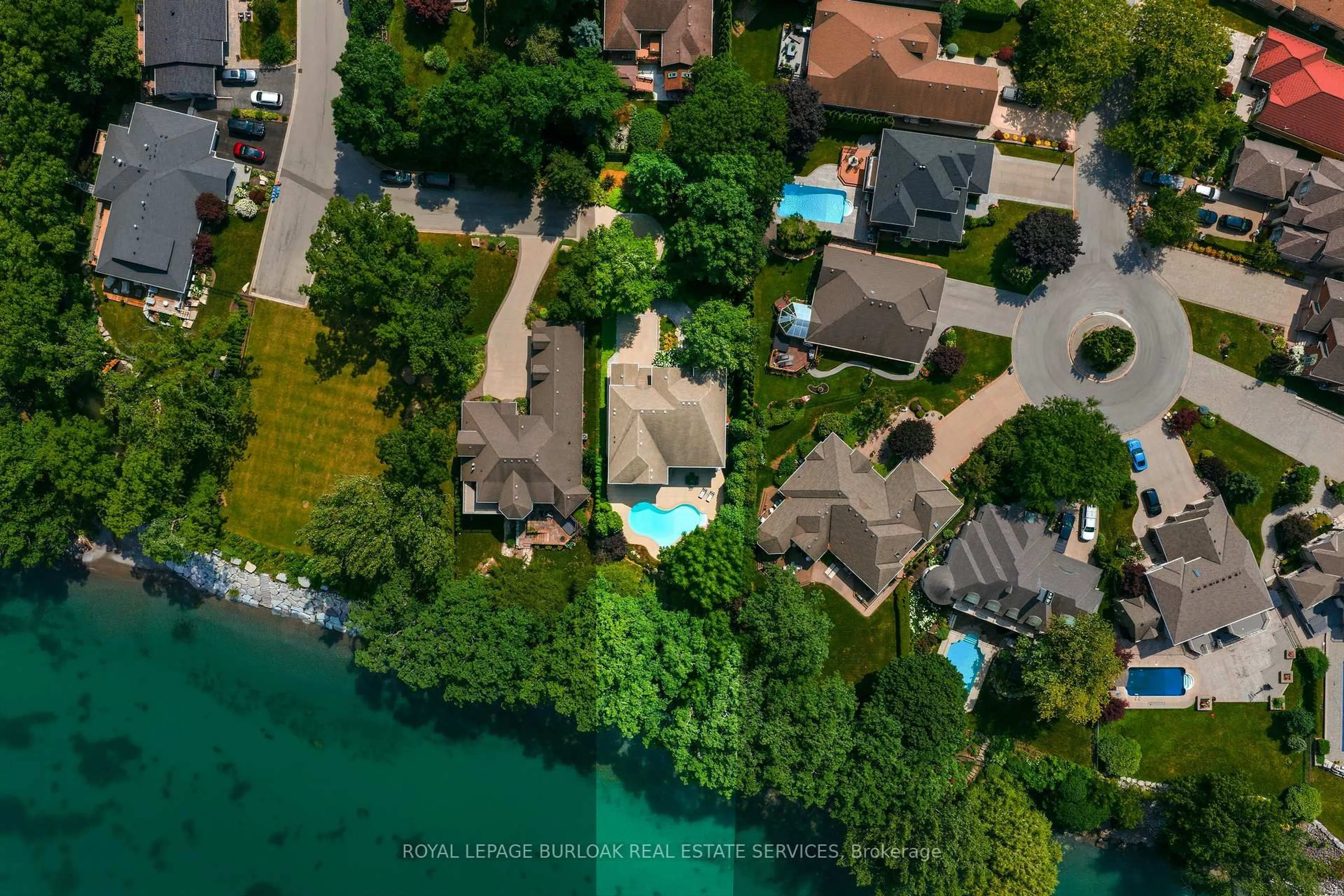 A pic from outside/outdoor area/front of a property/back of a property/a pic from drone, water/lake/river/ocean view for 143 Lake St #5, Grimsby Ontario L3M 4M6
