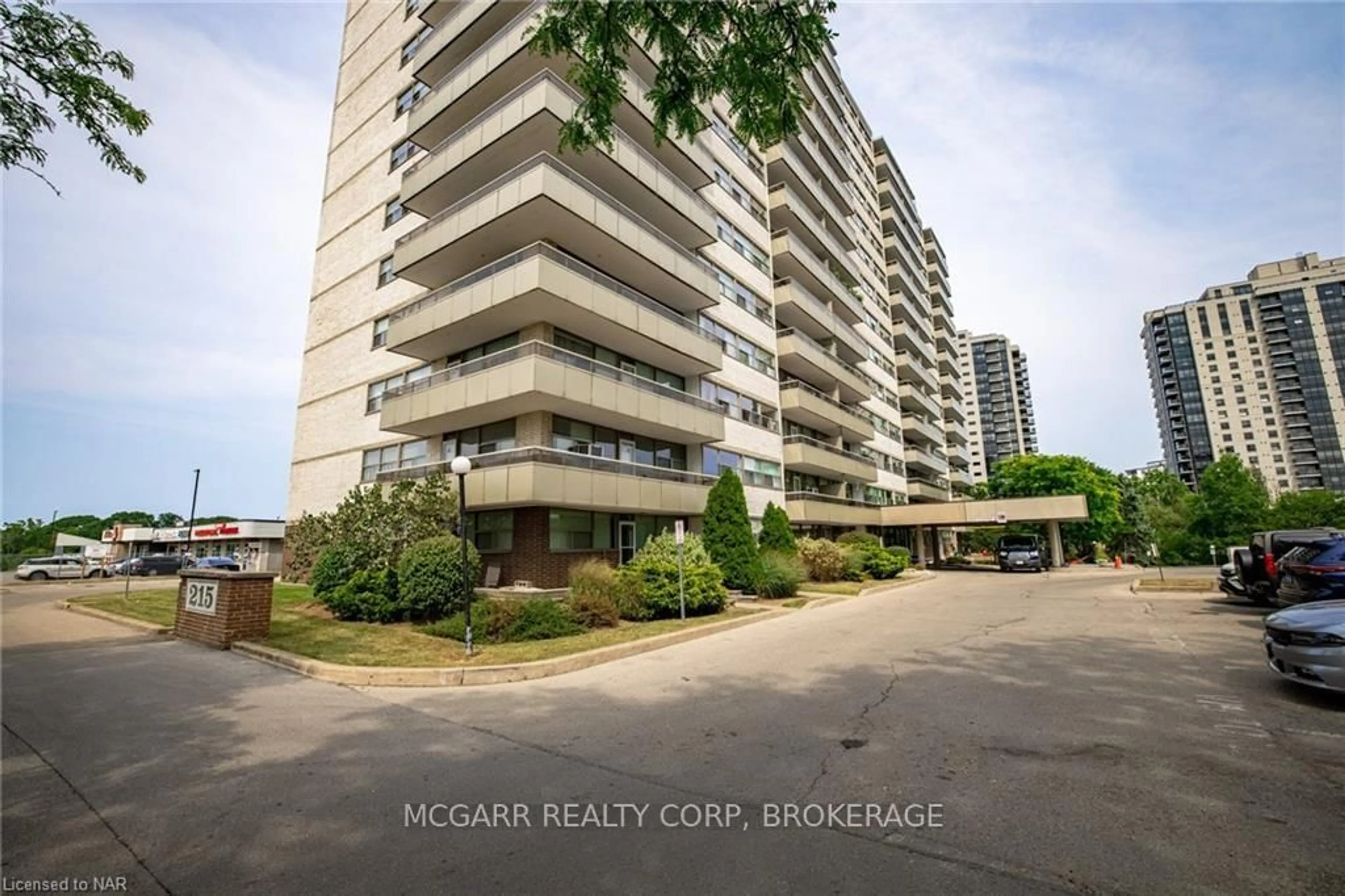 A pic from outside/outdoor area/front of a property/back of a property/a pic from drone, unknown for 215 Glenridge Ave #1410, St. Catharines Ontario L2T 3J7