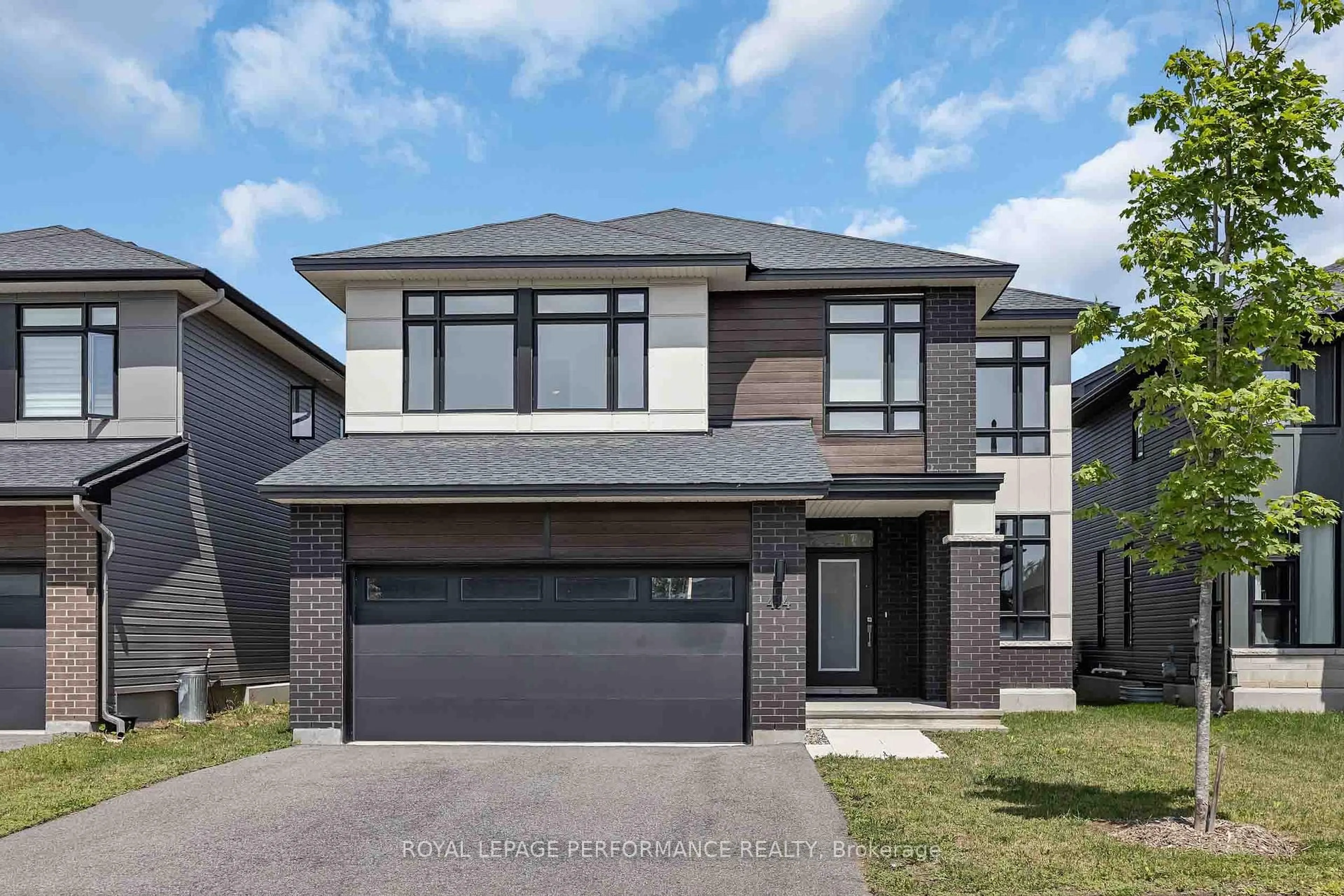 Home with brick exterior material, street for 414 Longworth Ave, Ottawa Ontario K1T 0T7