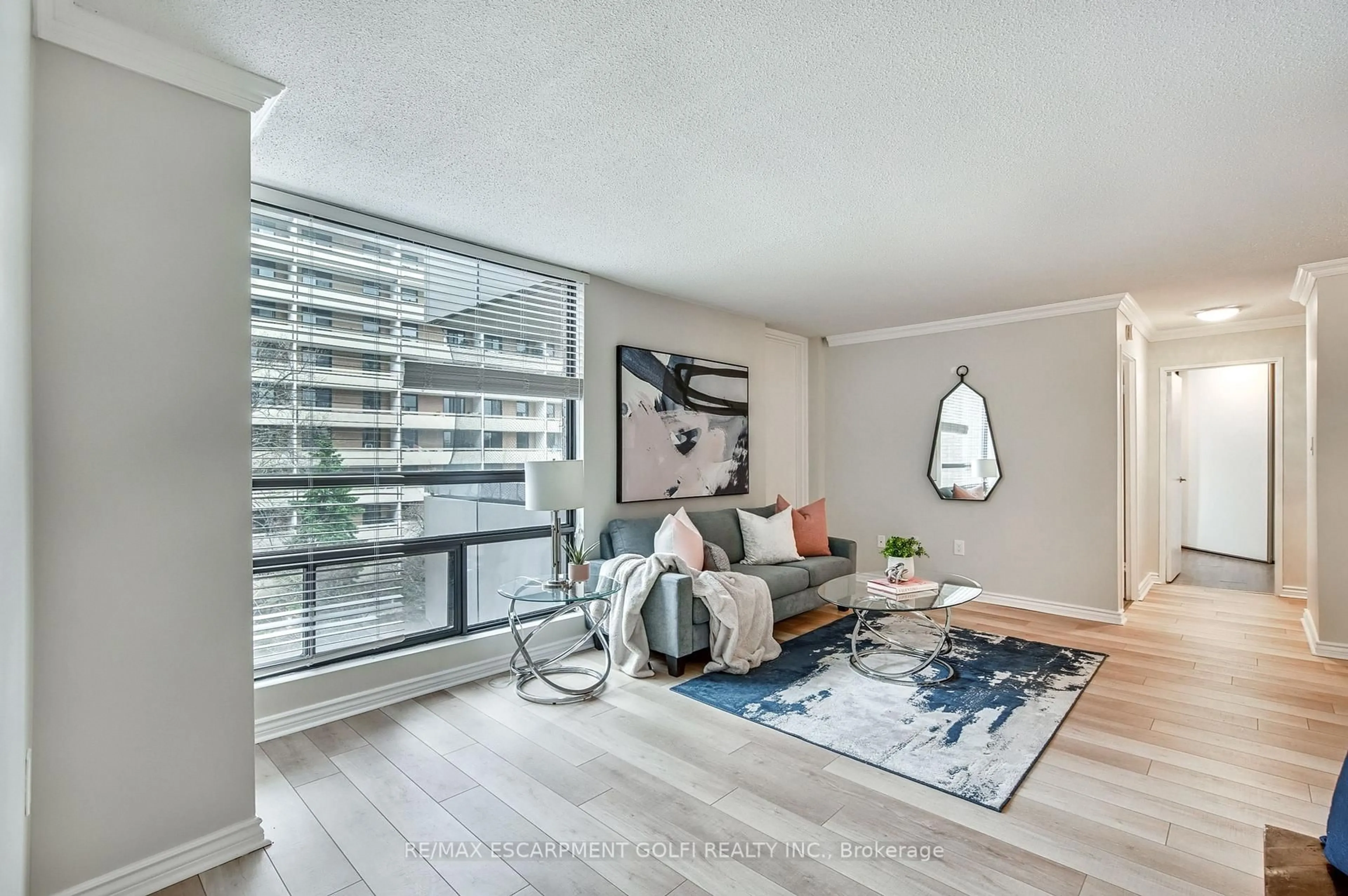 Living room with furniture, unknown for 222 Jackson St #305, Hamilton Ontario L8P 4S5