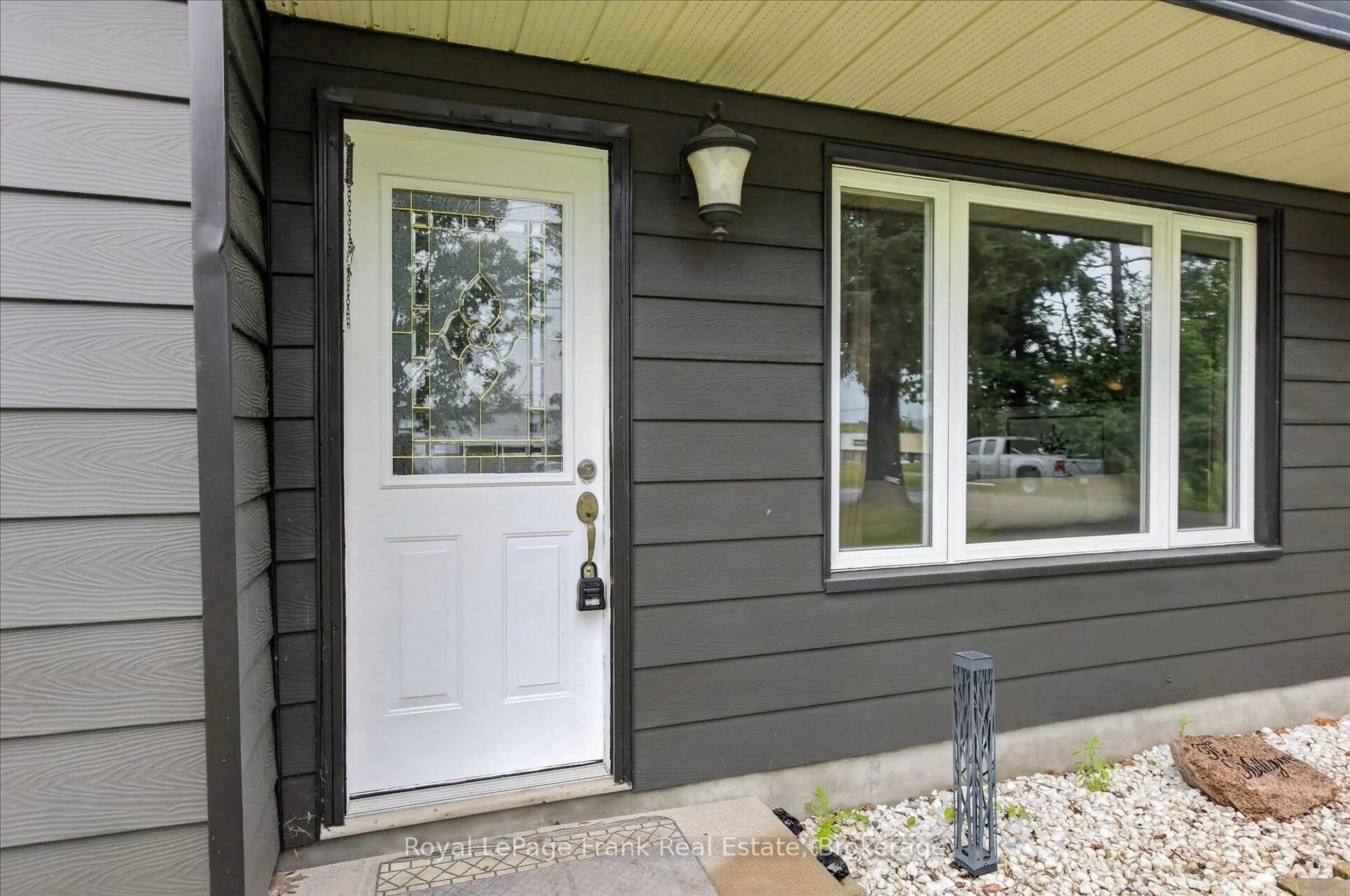 Home with vinyl exterior material, street for 731 Harper Rd, Peterborough Ontario K9J 6X6