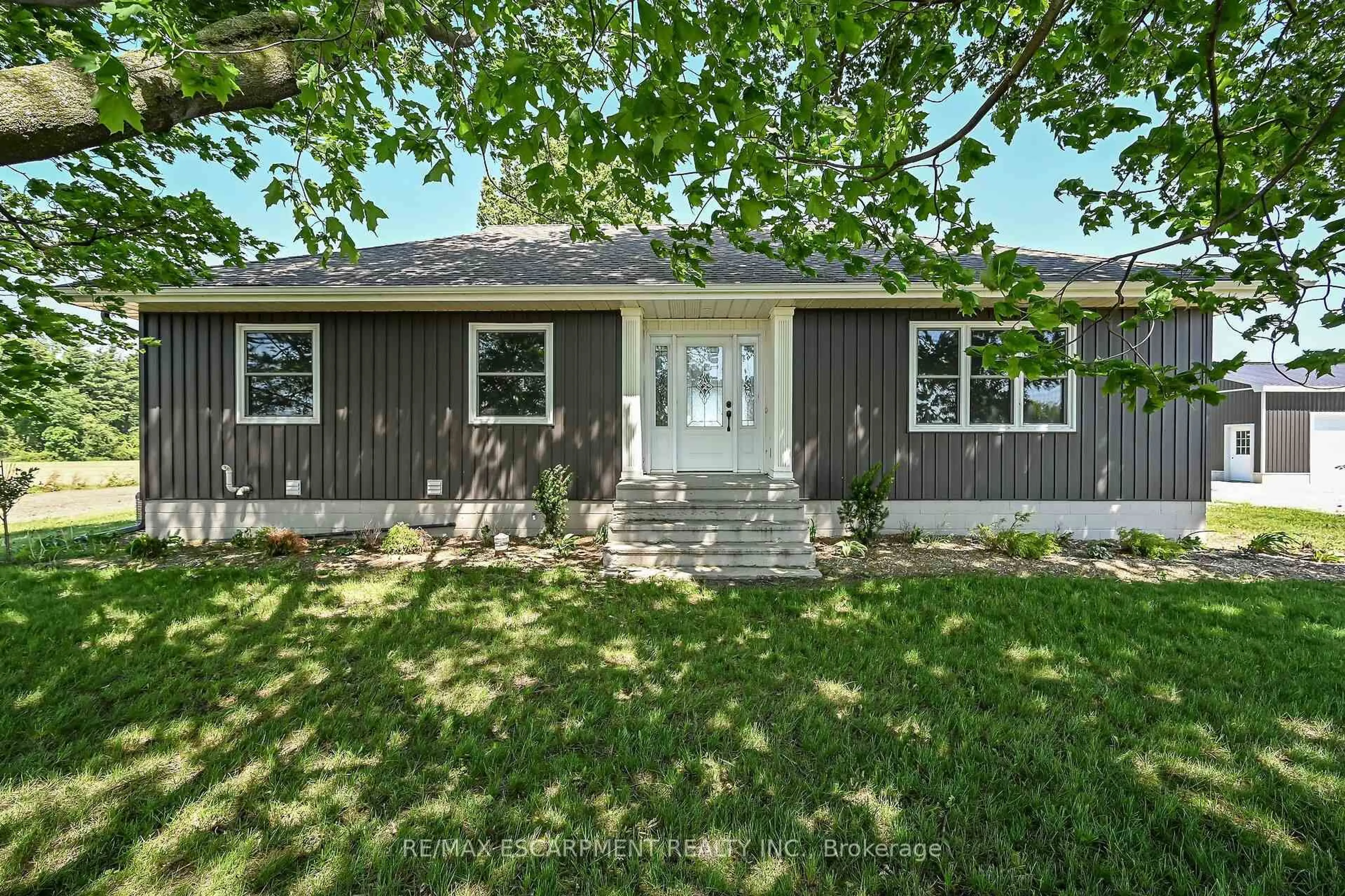 Home with vinyl exterior material, street for 2336 COCKSHUTT Rd, Norfolk Ontario N0E 1Y0