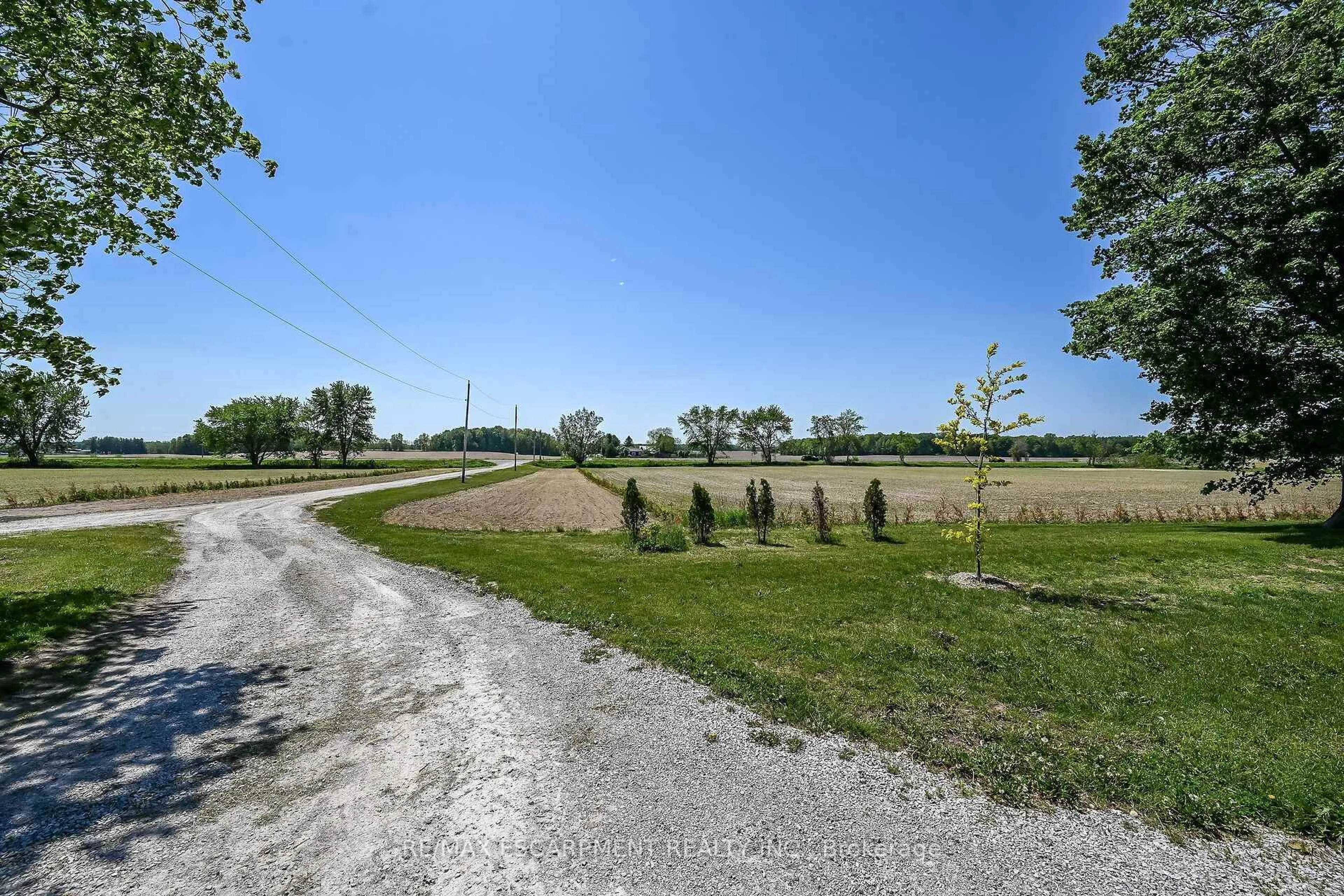 A pic from outside/outdoor area/front of a property/back of a property/a pic from drone, unknown for 2336 COCKSHUTT Rd, Norfolk Ontario N0E 1Y0