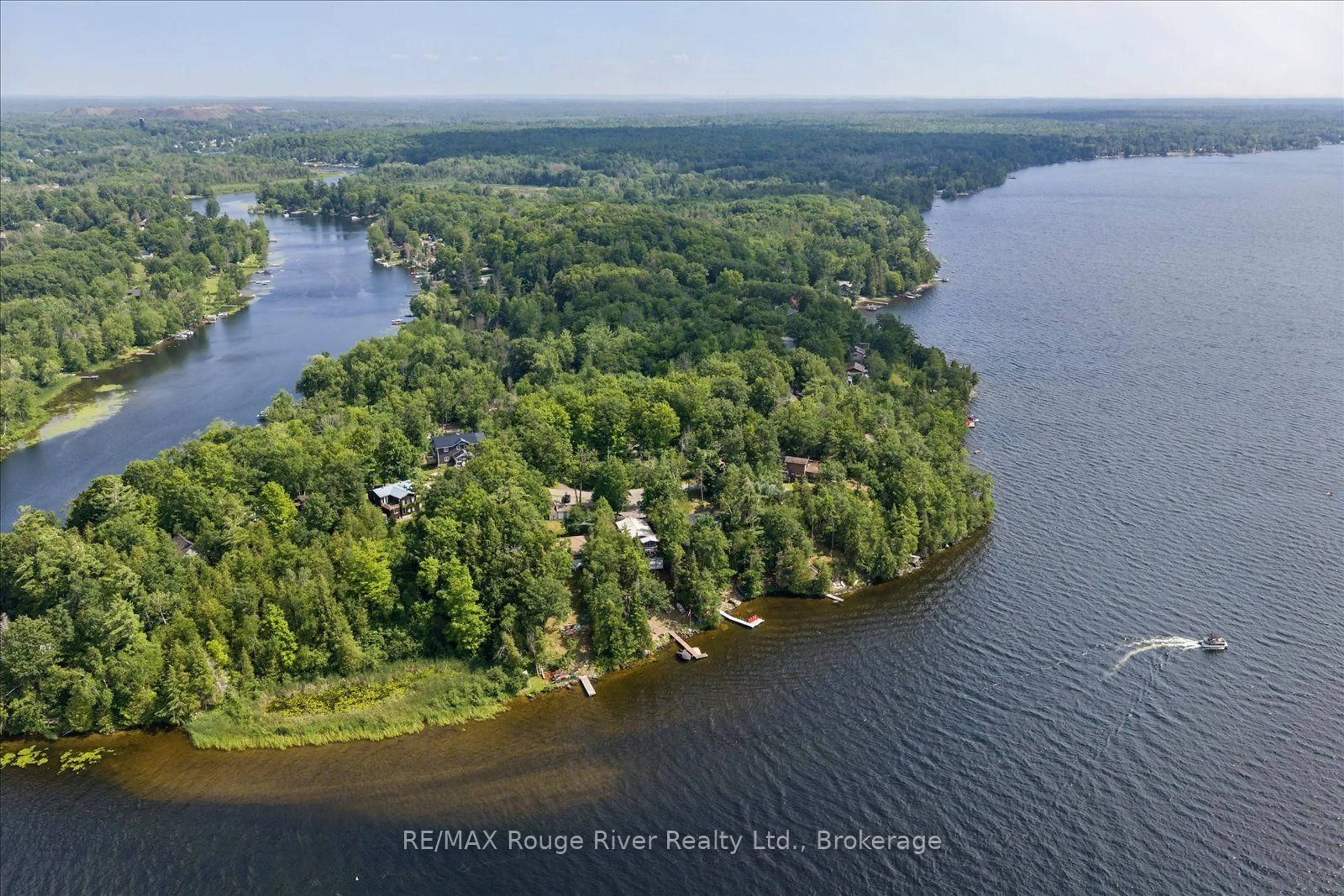 A pic from outside/outdoor area/front of a property/back of a property/a pic from drone, water/lake/river/ocean view for 734 Marble Point Rd, Limoges Ontario K0K 2M0
