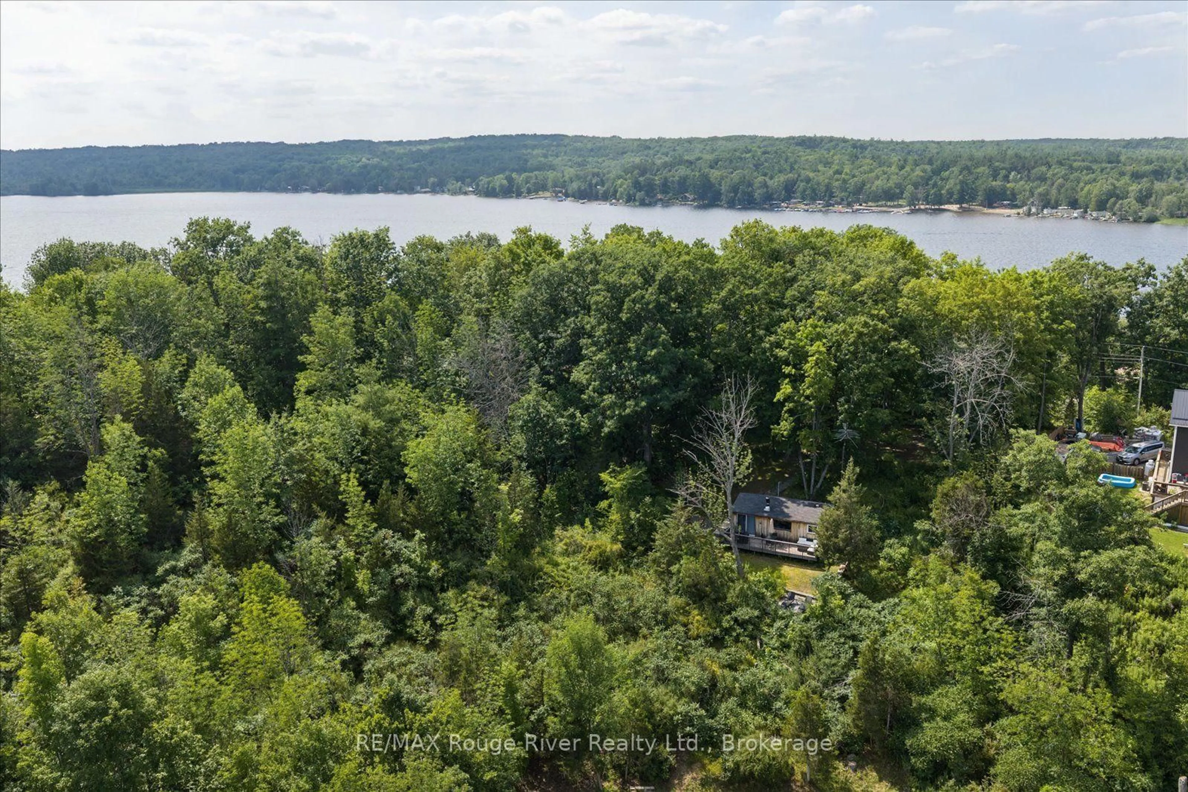 A pic from outside/outdoor area/front of a property/back of a property/a pic from drone, water/lake/river/ocean view for 734 Marble Point Rd, Limoges Ontario K0K 2M0