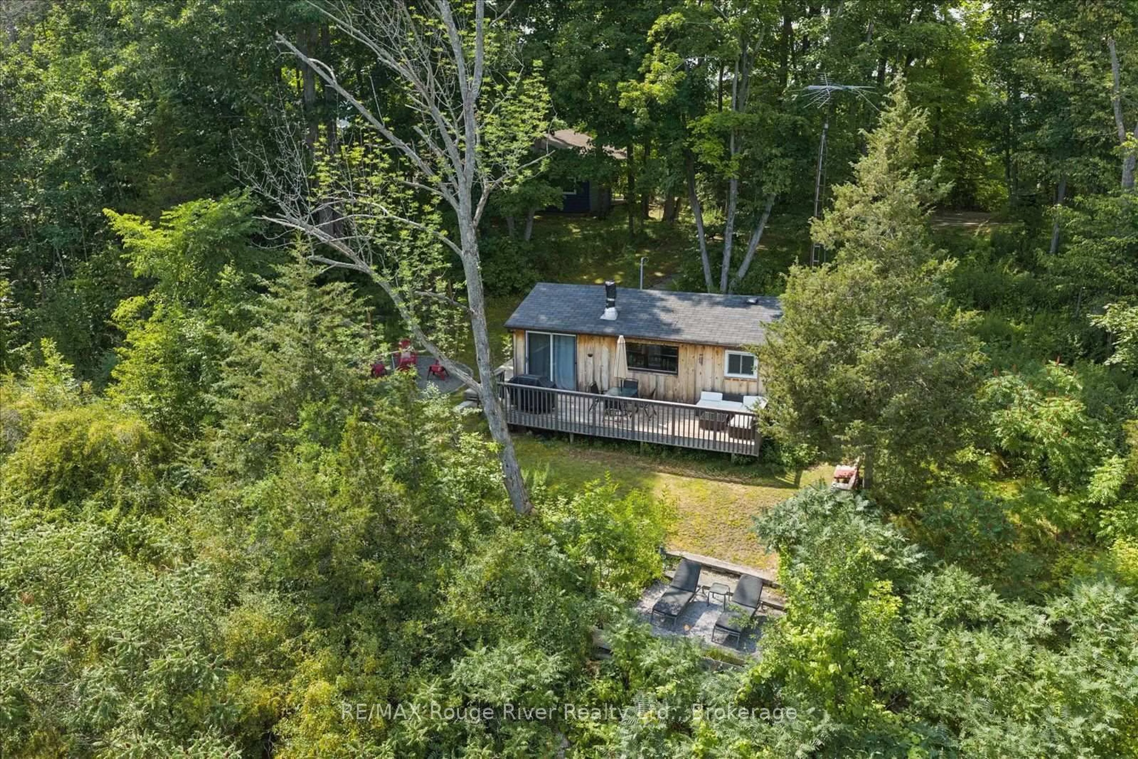 A pic from outside/outdoor area/front of a property/back of a property/a pic from drone, forest/trees view for 734 Marble Point Rd, Limoges Ontario K0K 2M0